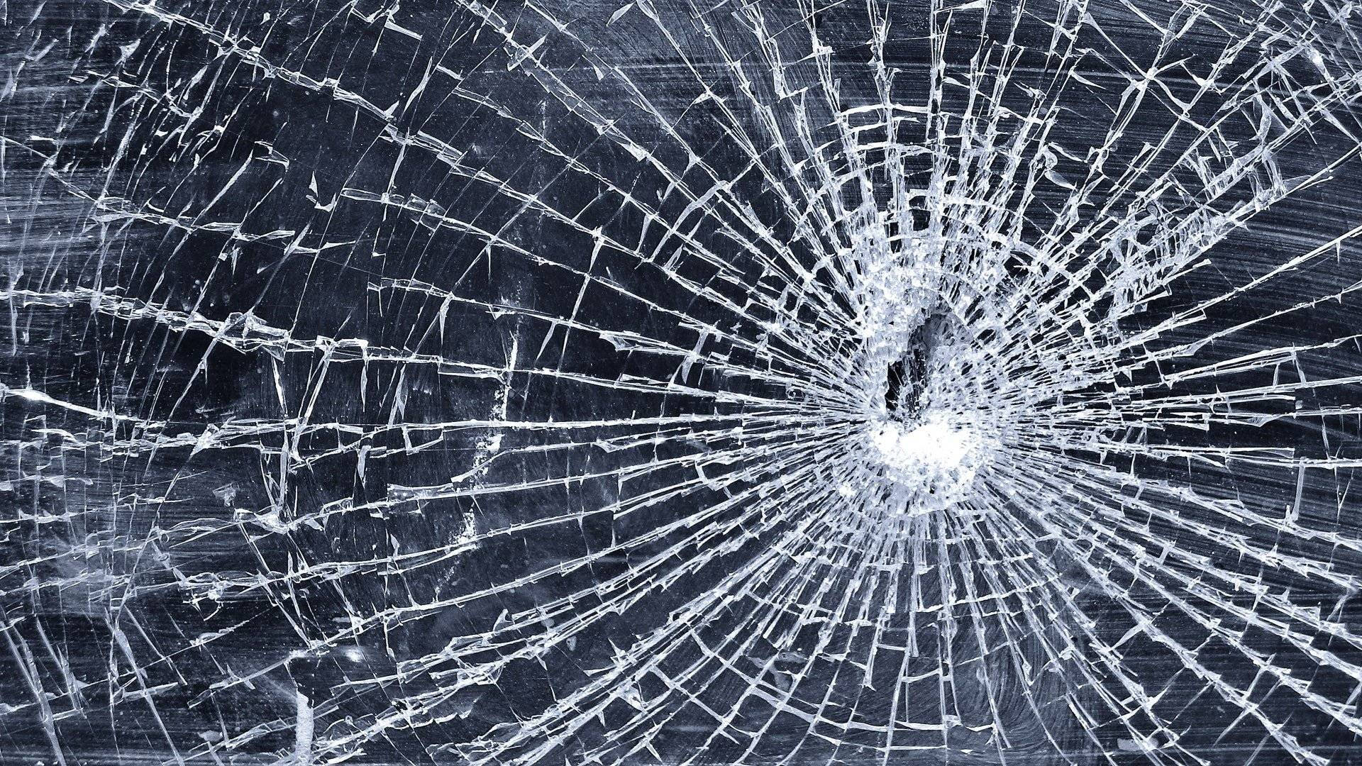 broken screen monitor, shattered glass, central impact point, Full HD Desktop Wallpaper