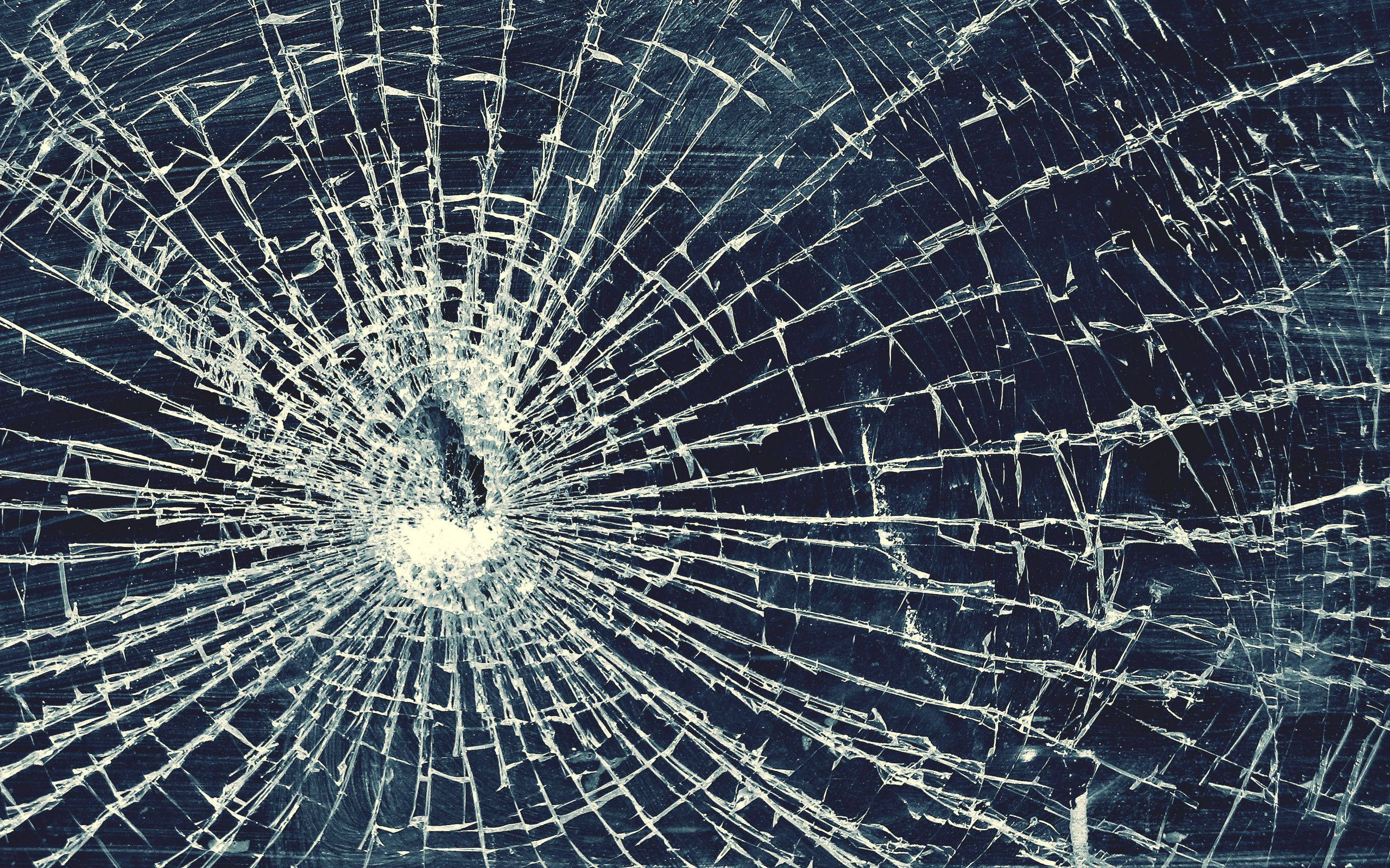 cracked screen, shattered glass, central impact point, 2K Desktop Wallpaper
