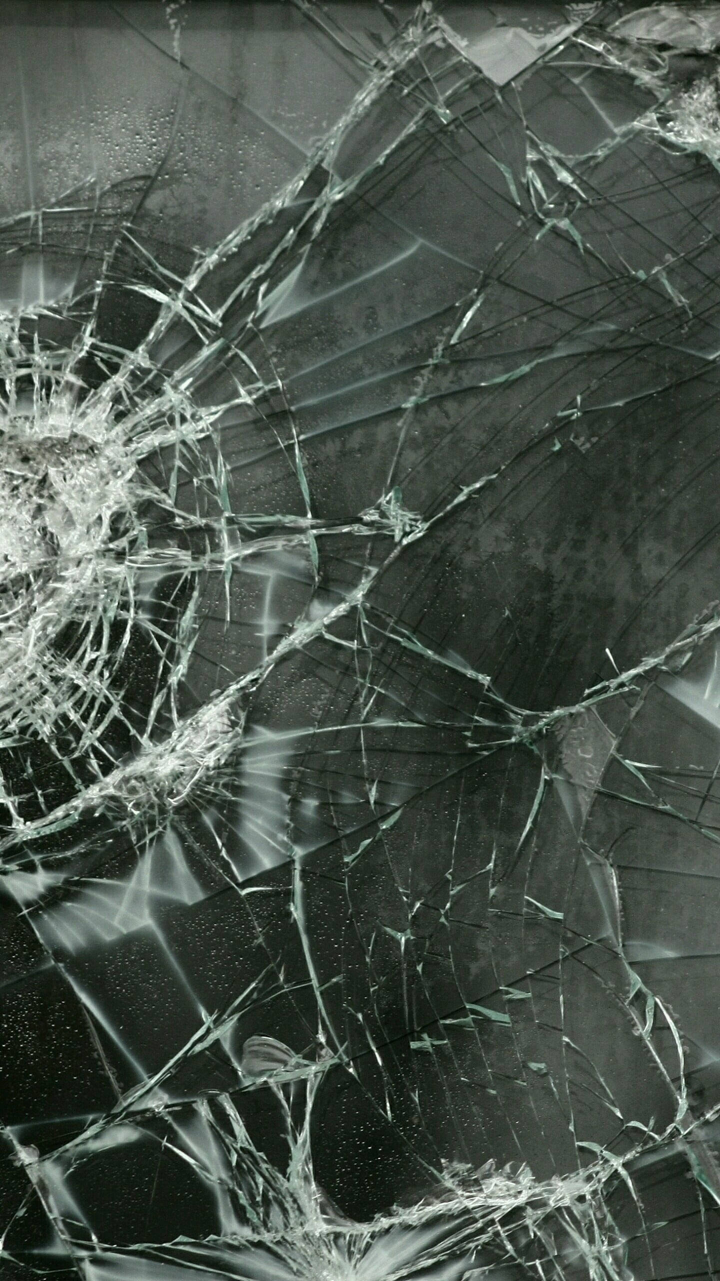 shattered glass surface, intricate cracks, reflective shards, 2K Phone Wallpaper
