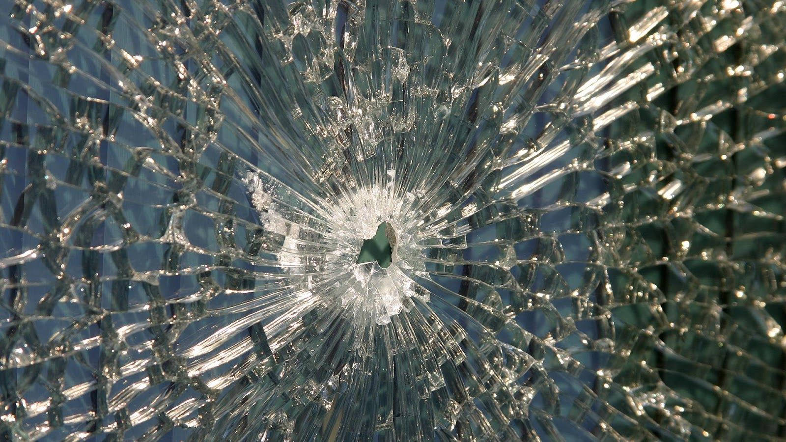 cracked screen, shattered glass, central impact point, HD Desktop Wallpaper