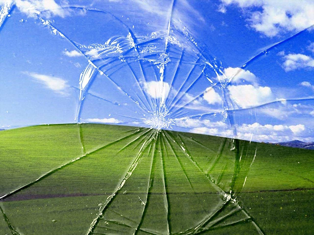 cracked computer screen, vibrant green field, bright blue sky, HD Desktop Wallpaper