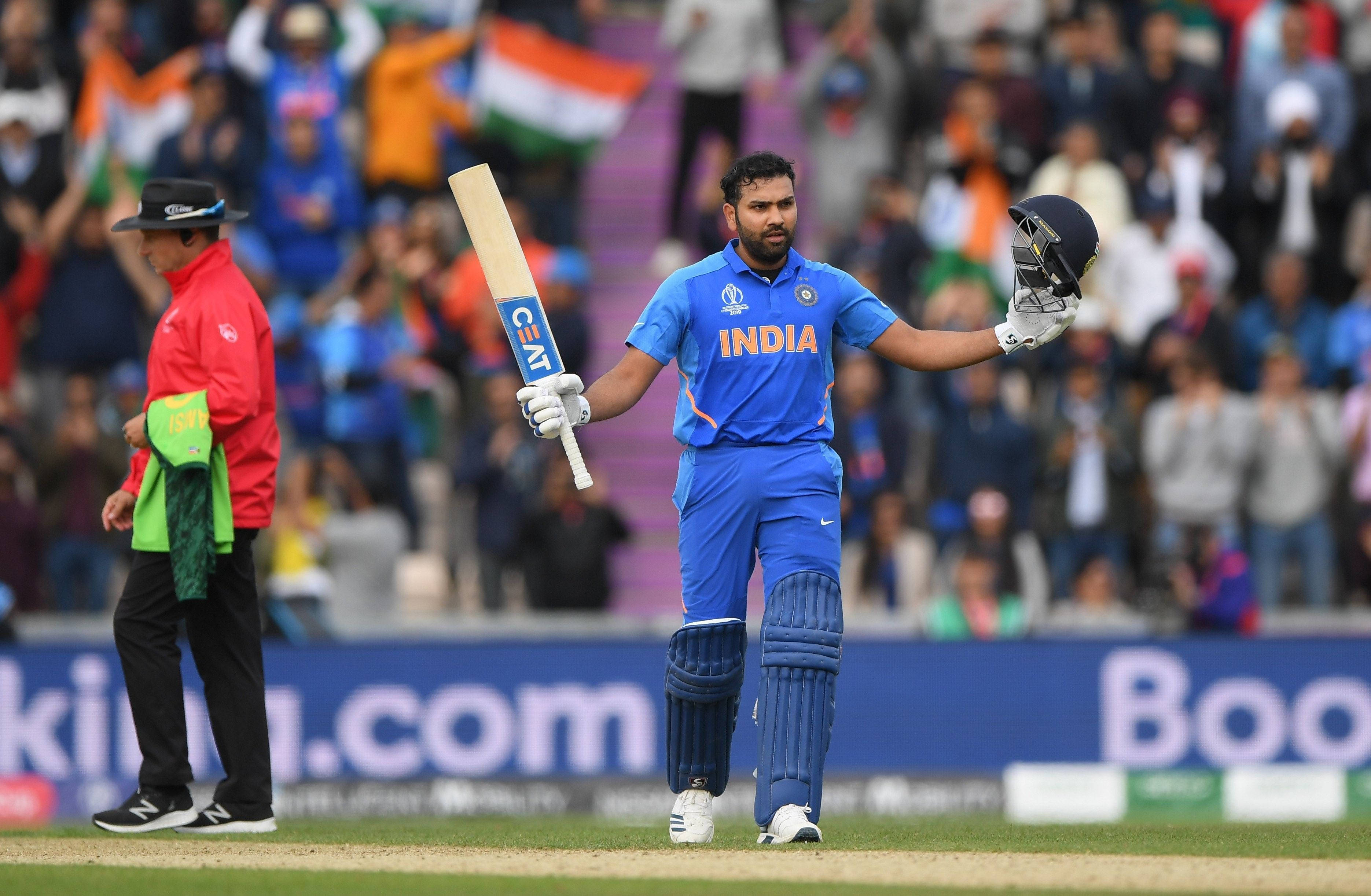 Indian cricket player, blue uniform, bat, 2K Desktop Wallpaper