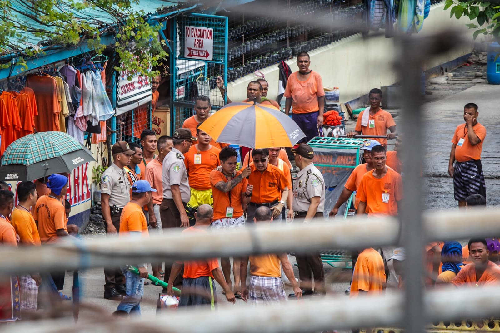 Heinous Criminal Prison, orange shirts, umbrellas, HD Desktop Wallpaper