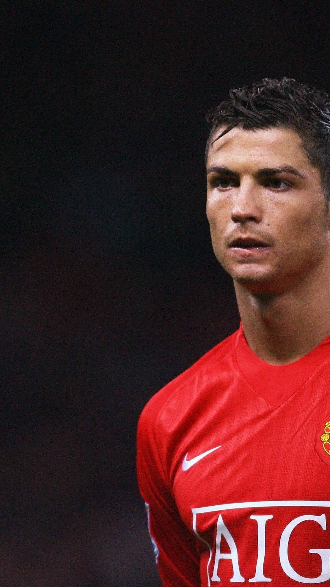 Cristiano Ronaldo, red Manchester United jersey, dark blurred background, Full HD Phone Wallpaper
