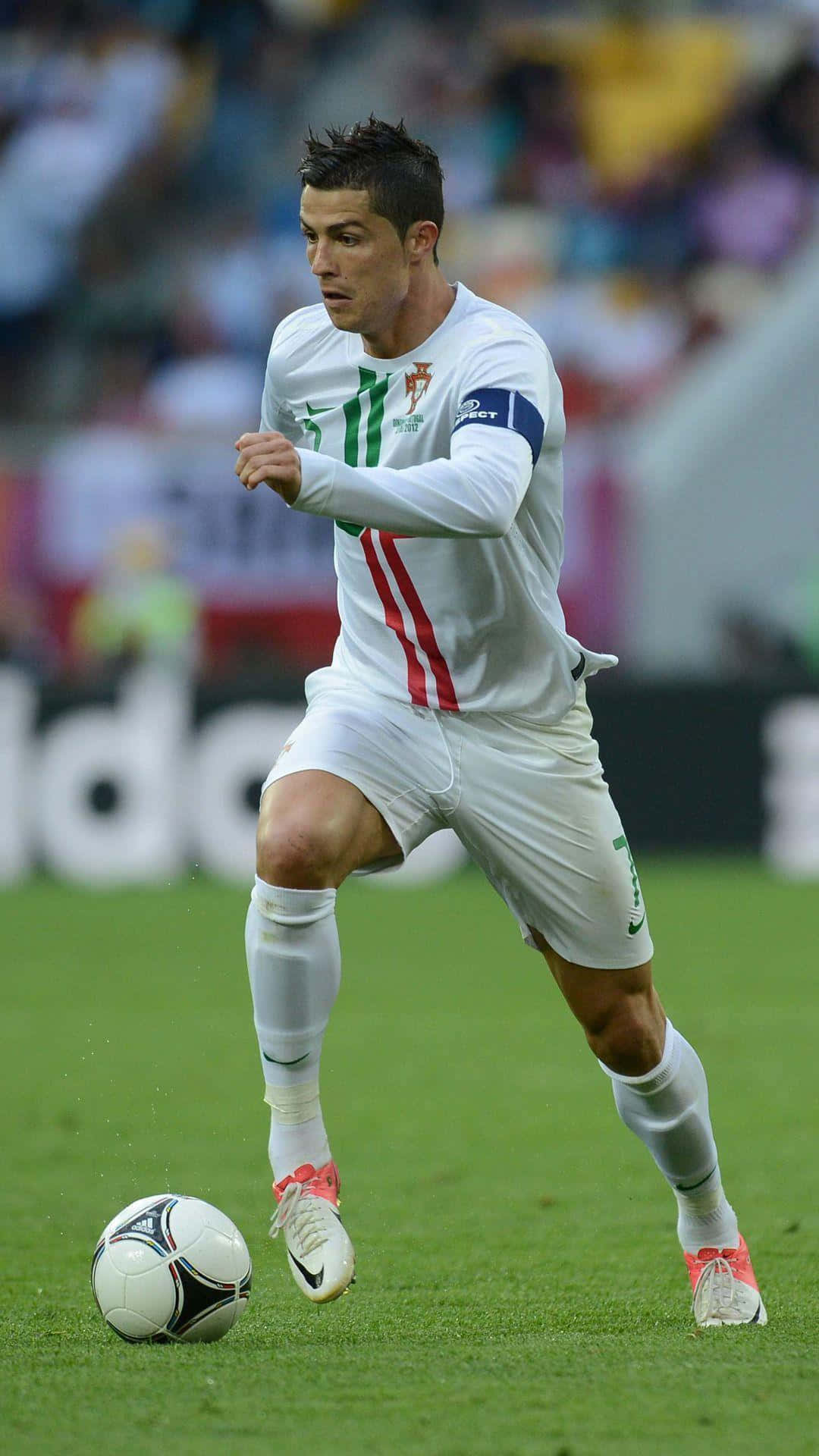 Cristiano Ronaldo, white Portugal jersey, vibrant green pitch, Full HD Phone Wallpaper