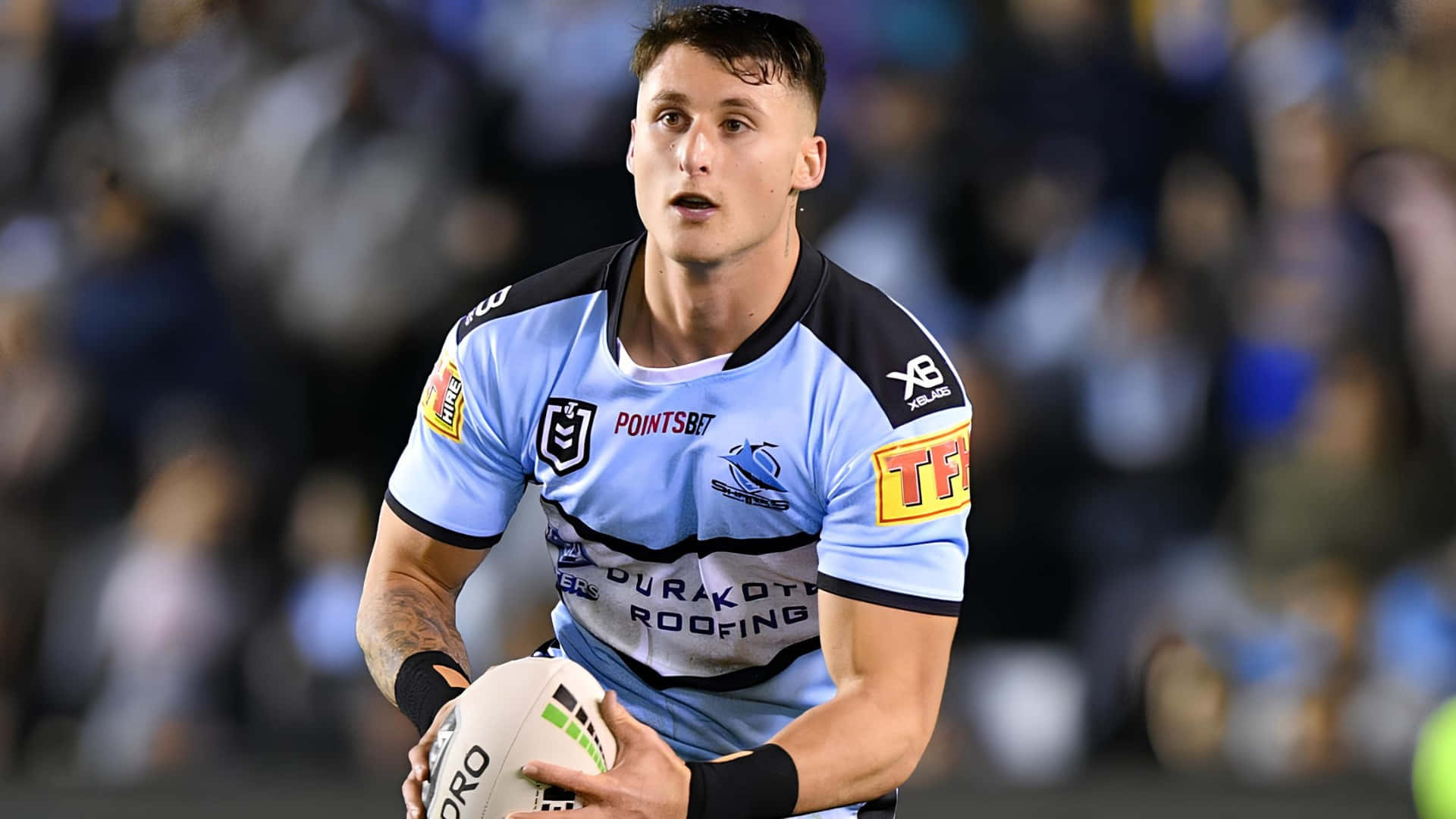 Cronulla Sharks, light blue and black jersey, white ball, Full HD Desktop Wallpaper