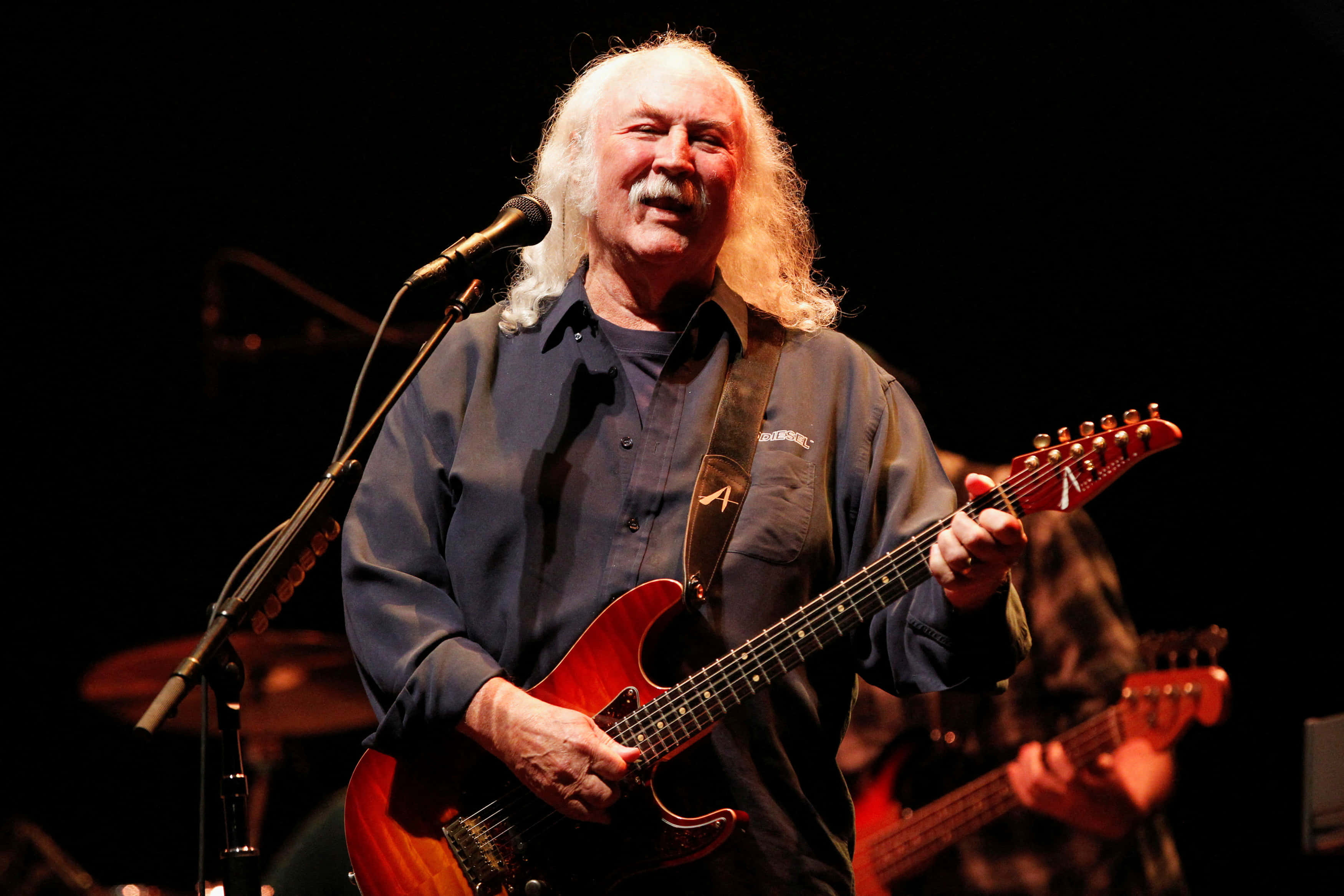 Crosby Stills And Nash, red electric guitar, dark stage, 2K Desktop Wallpaper