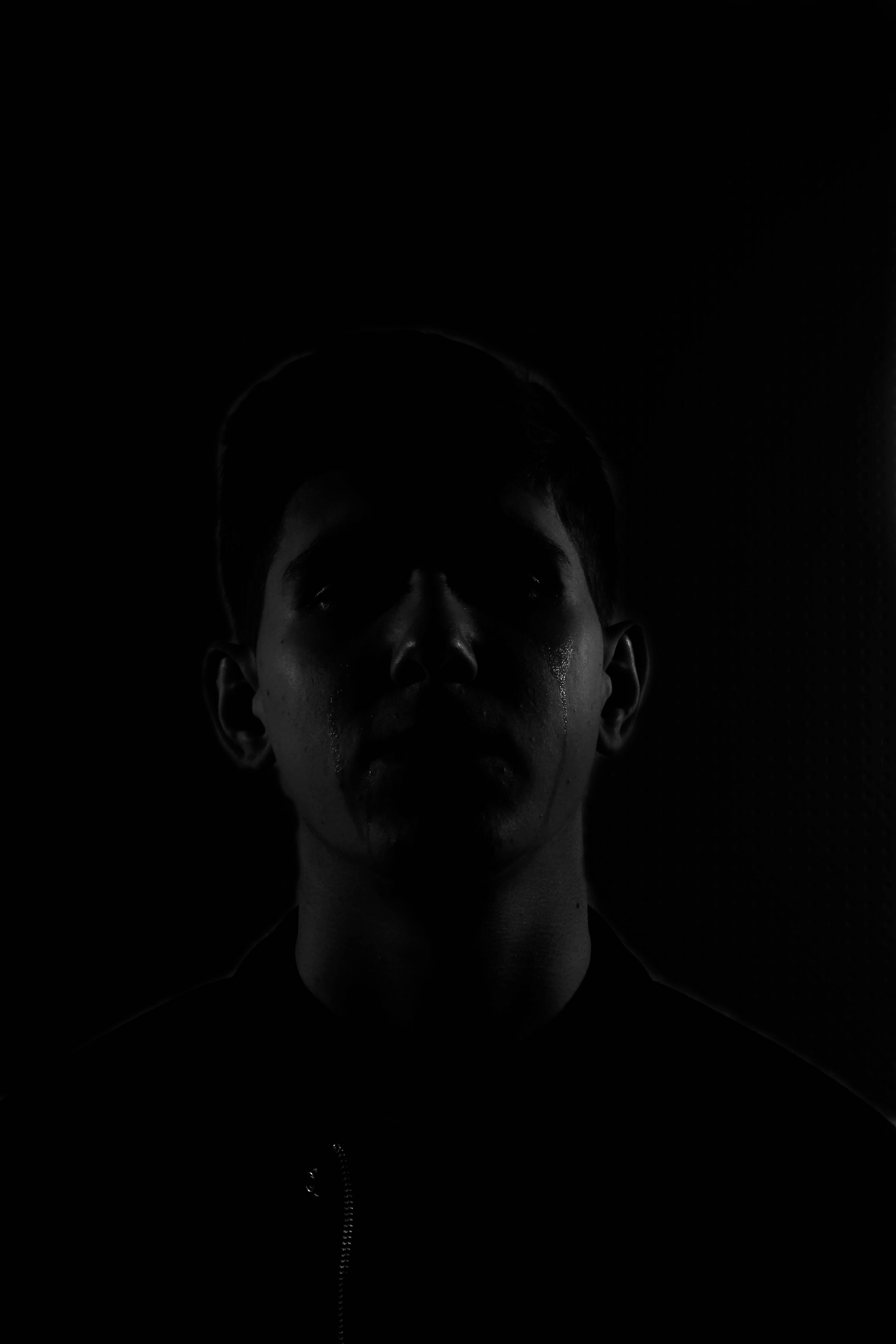 Crying Sad Boy, dramatic photography, near-total darkness, 4K Phone Wallpaper