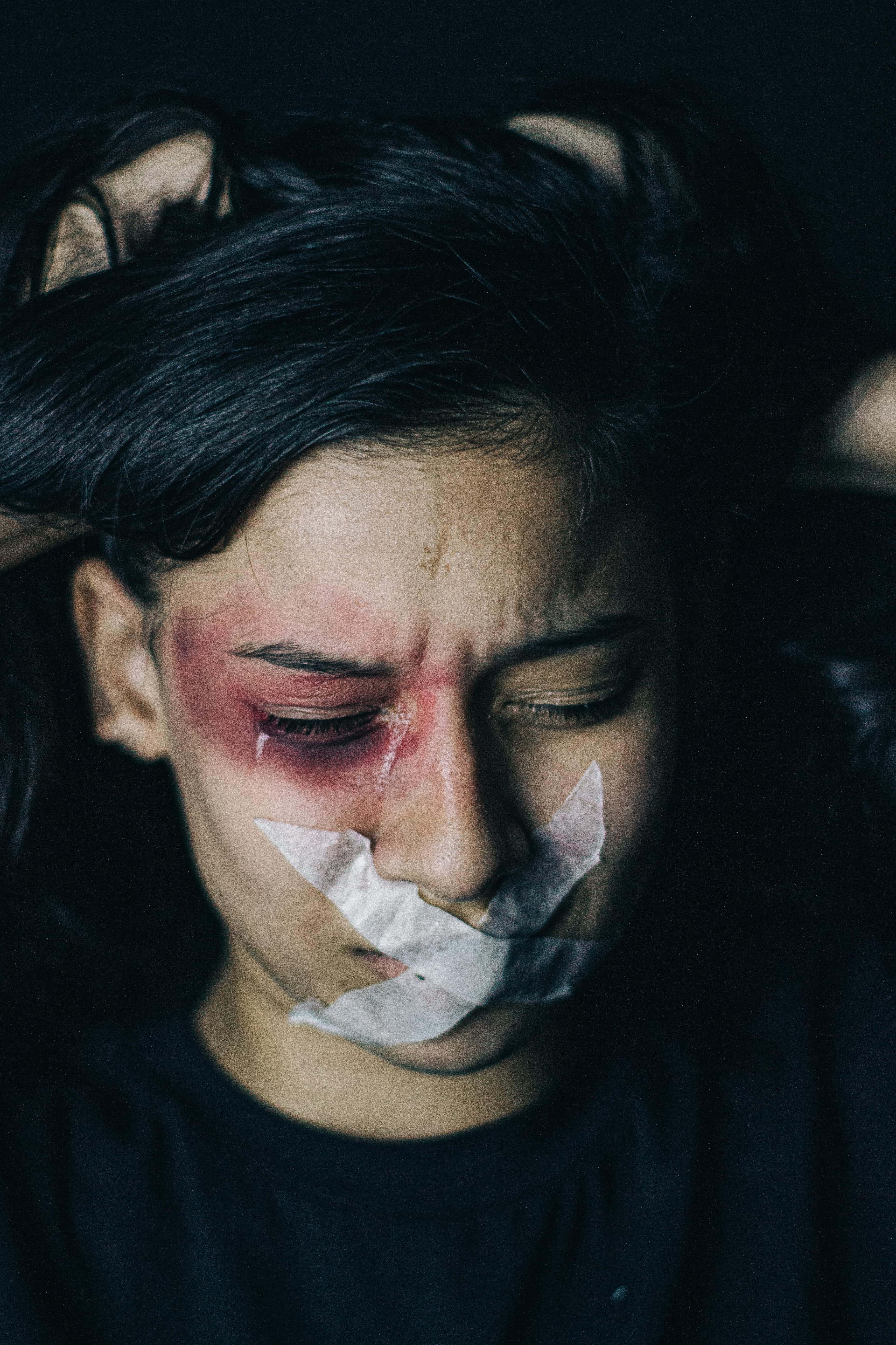 tape on mouth, bruised face, dark lighting, 5K Phone Wallpaper