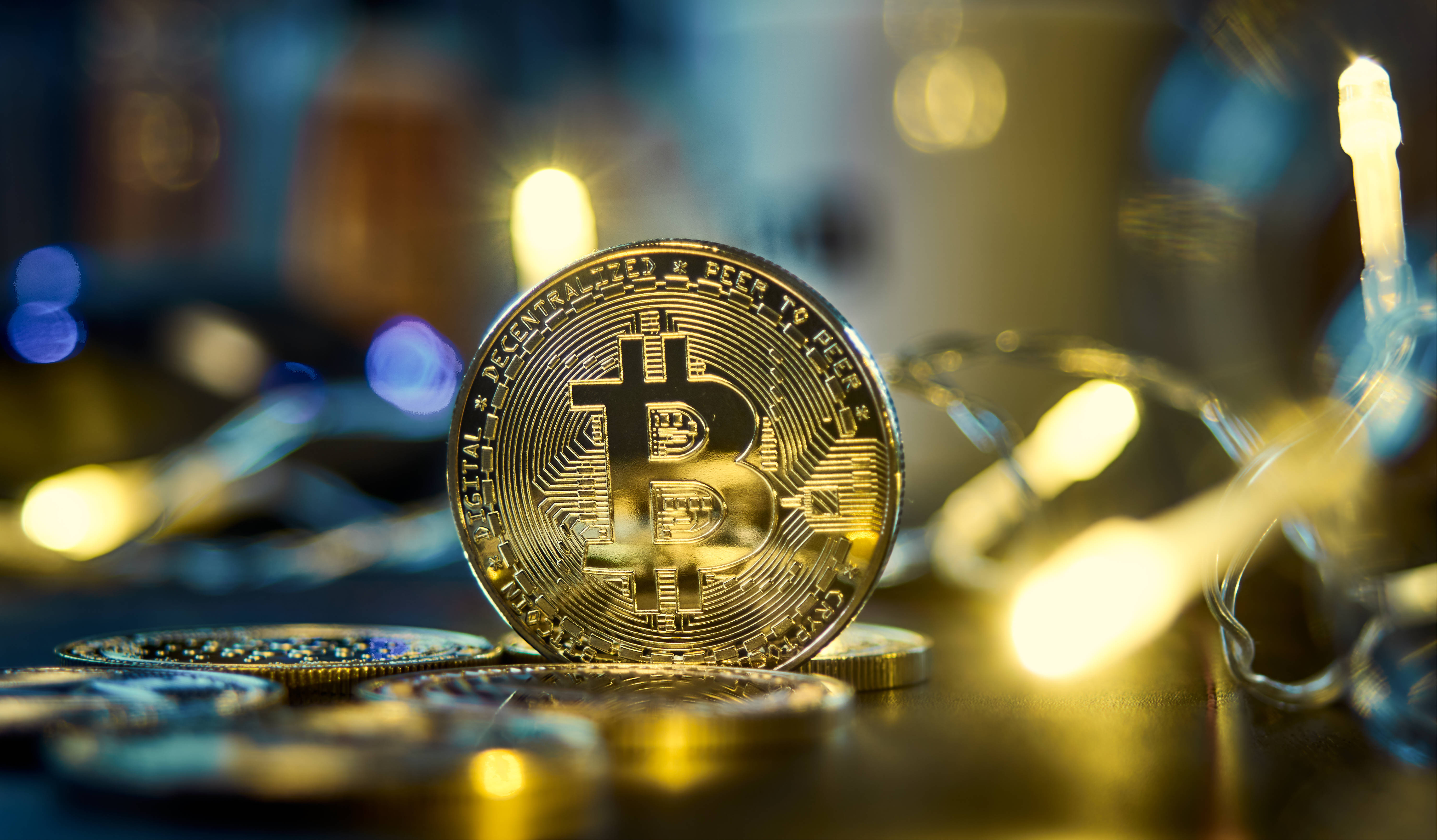 shiny golden bitcoin, gleaming gold Bitcoin coin, warm fairy lights, 5K Desktop Wallpaper