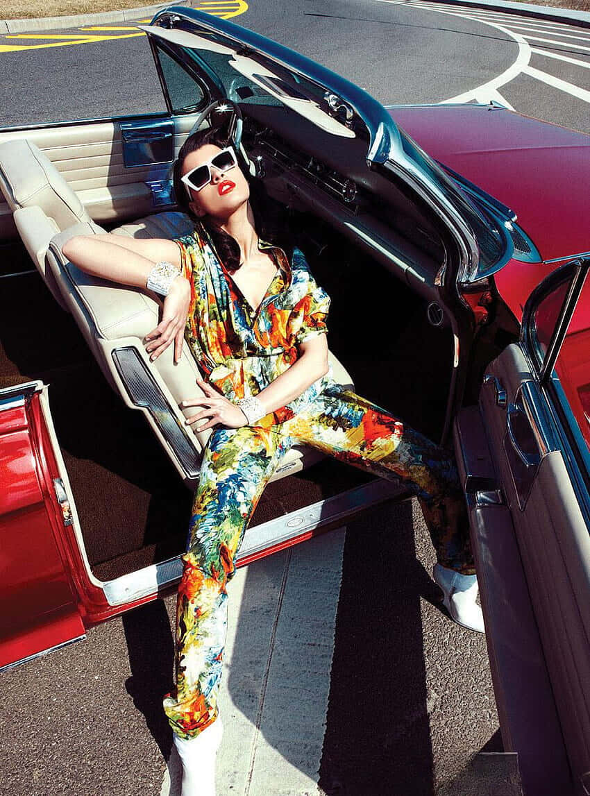 Crystal Renn, floral jumpsuit, red classic convertible, SD Phone Wallpaper