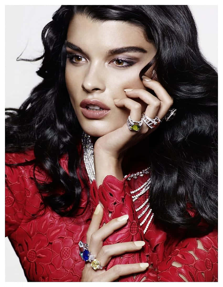 Crystal Renn, red floral textured outfit, multiple colorful rings, SD Phone Wallpaper