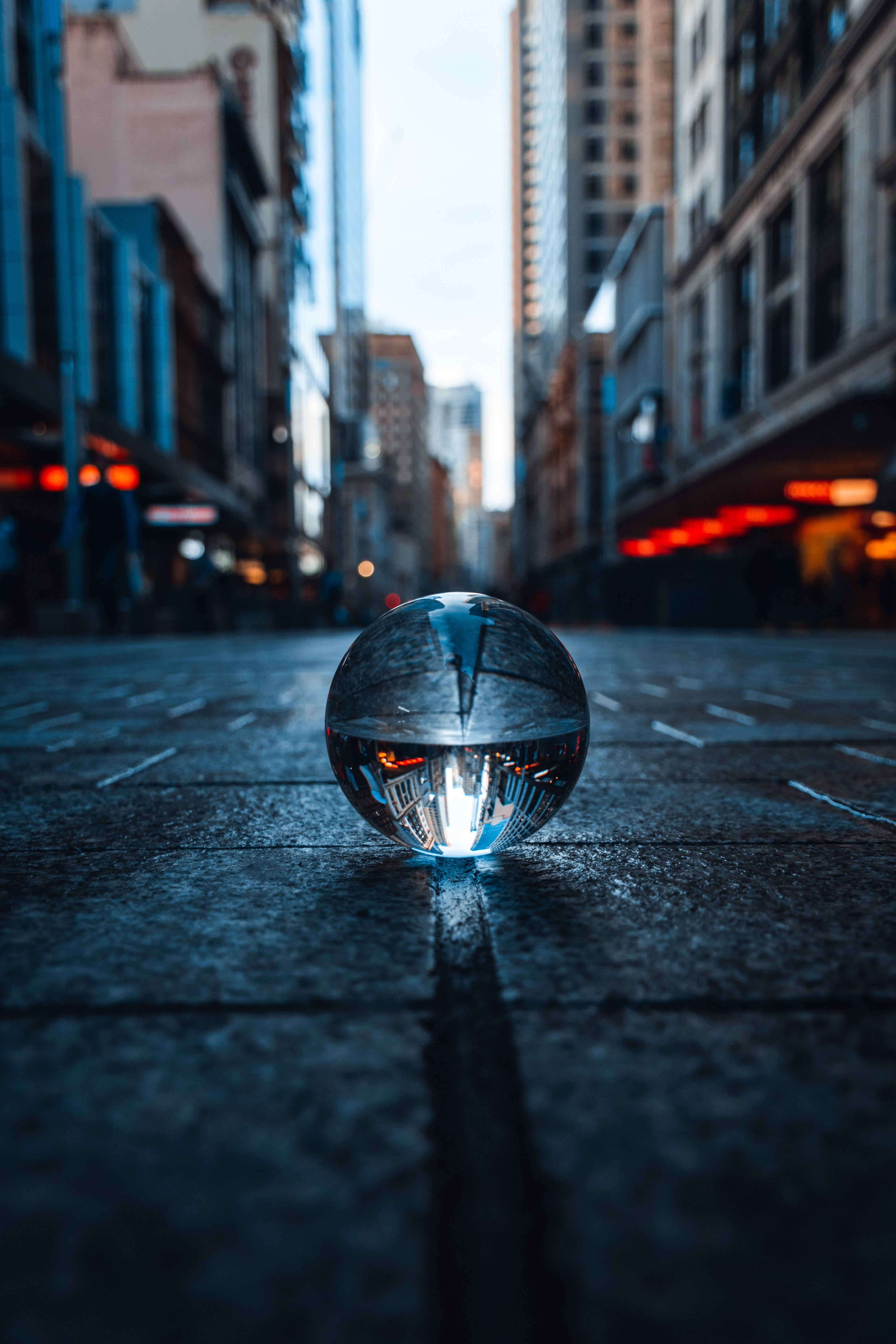 crystal ball, glass sphere, wet city street, 5K Phone Wallpaper
