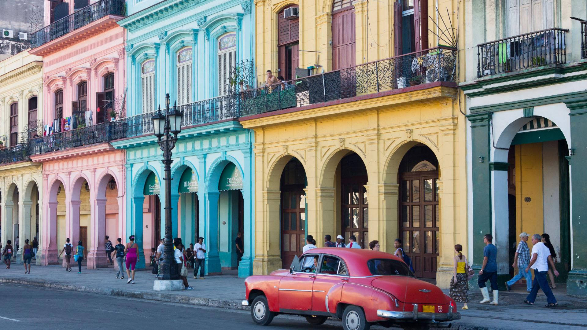 historical place in cuba, pastel-colored colonial buildings, bustling street, Full HD Desktop Wallpaper