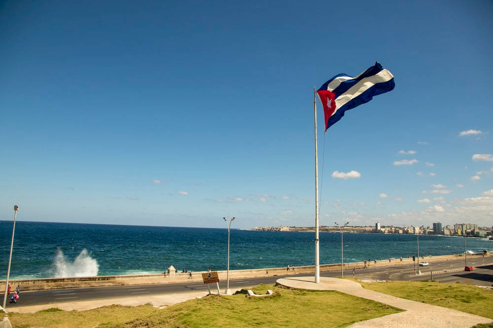 Cuban flag, coastal road park, turquoise ocean, SD Desktop Wallpaper