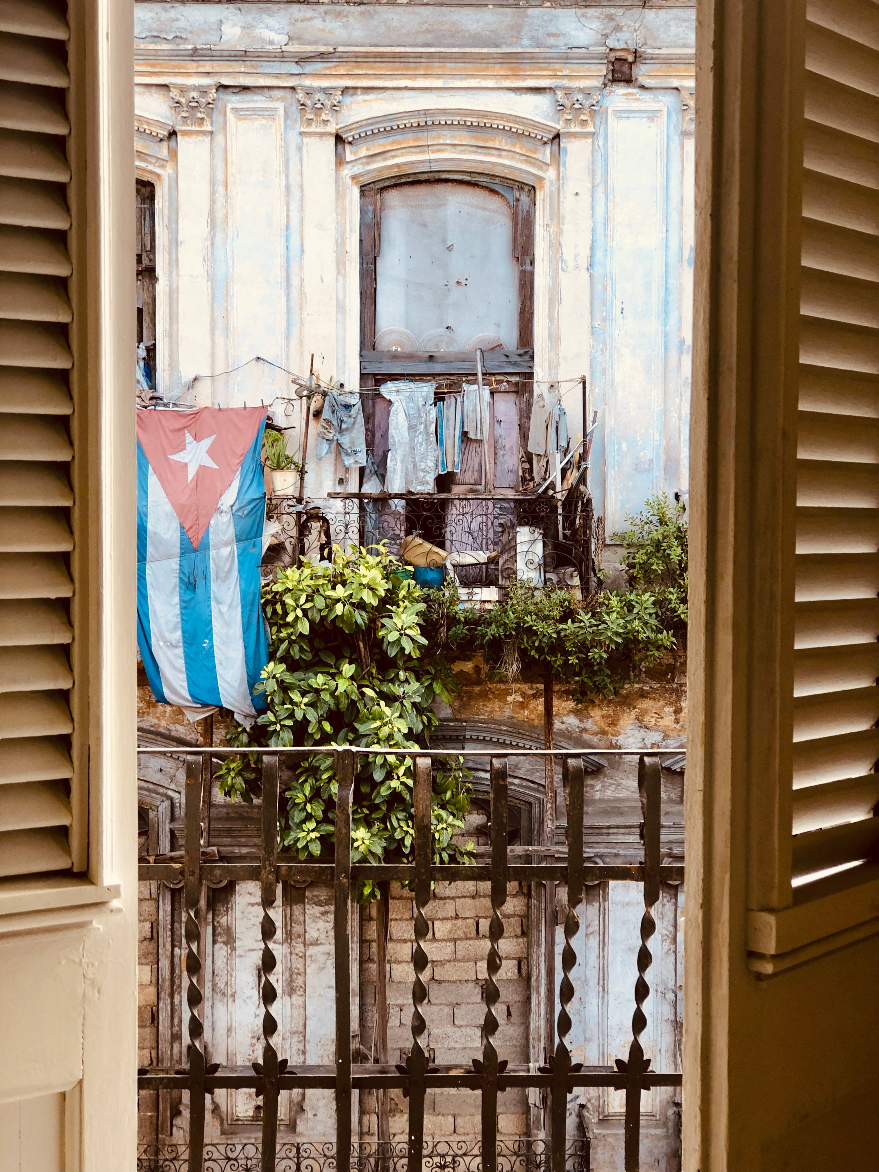 Cuban flag, balcony, crumbling colonial building, 4K Phone Wallpaper
