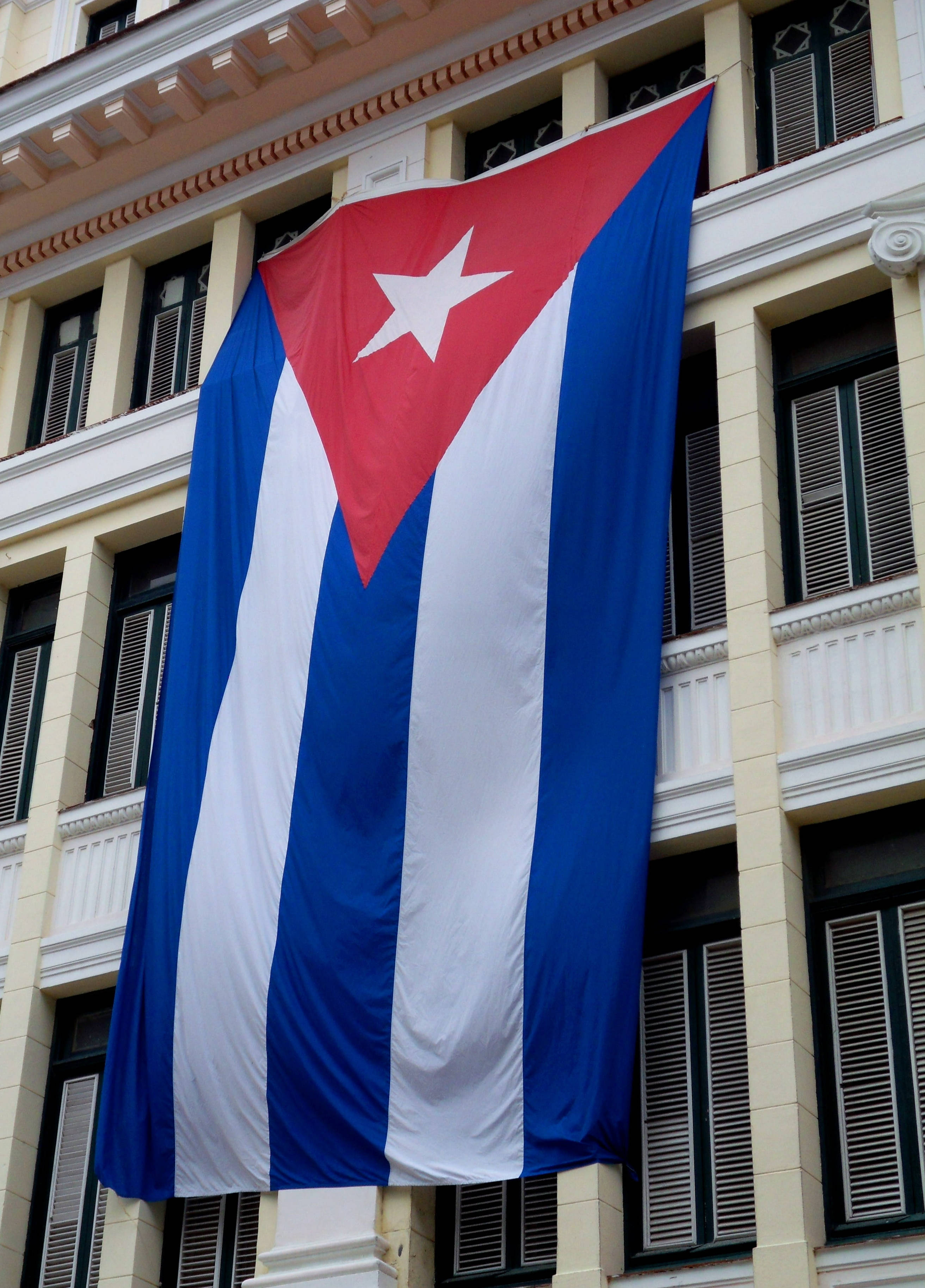 Cuban flag, classical Cuban building, red white and blue stripes, 2K Phone Wallpaper