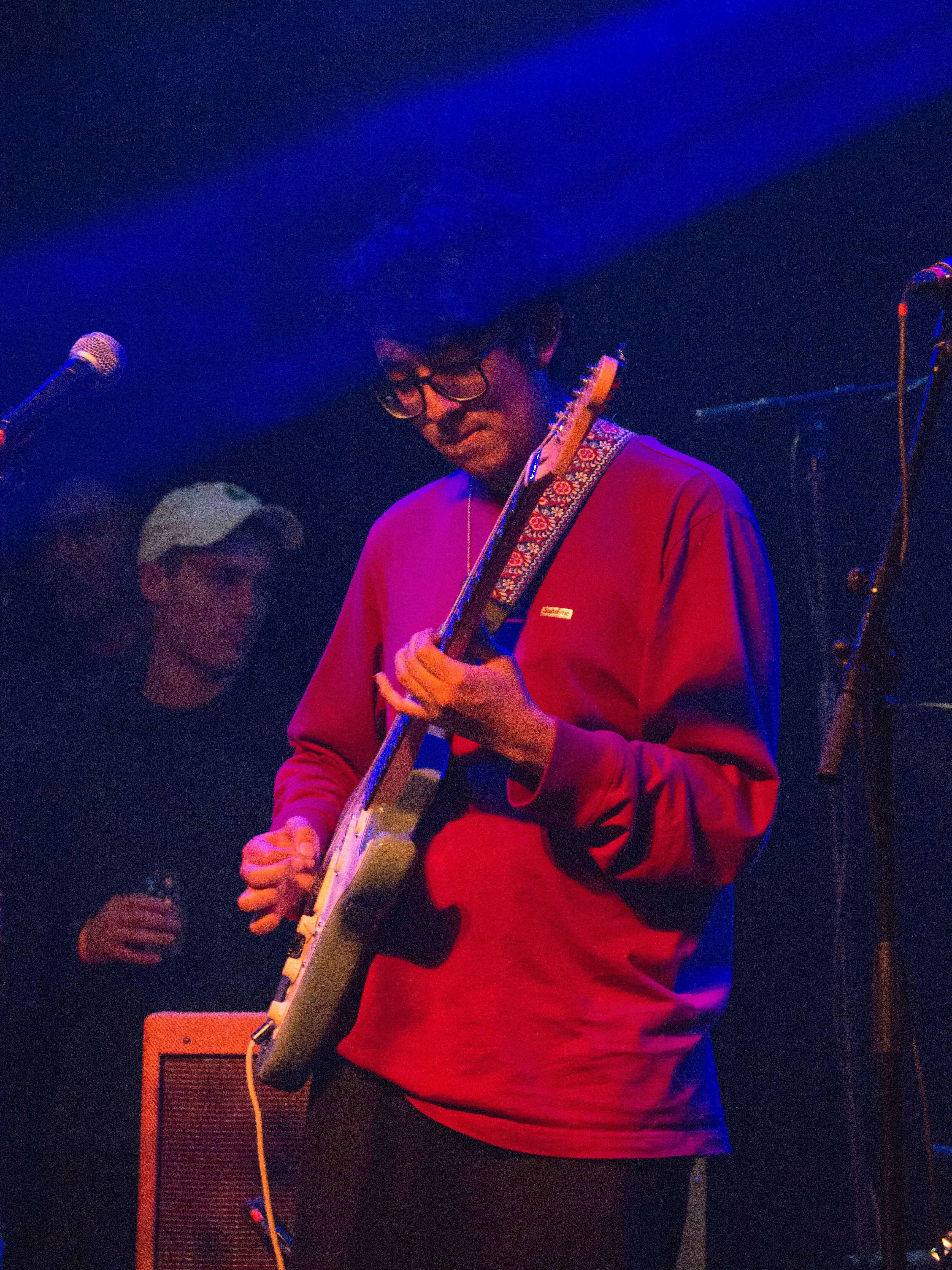 Cuco, electric guitar, blue stage lights, 4K Phone Wallpaper