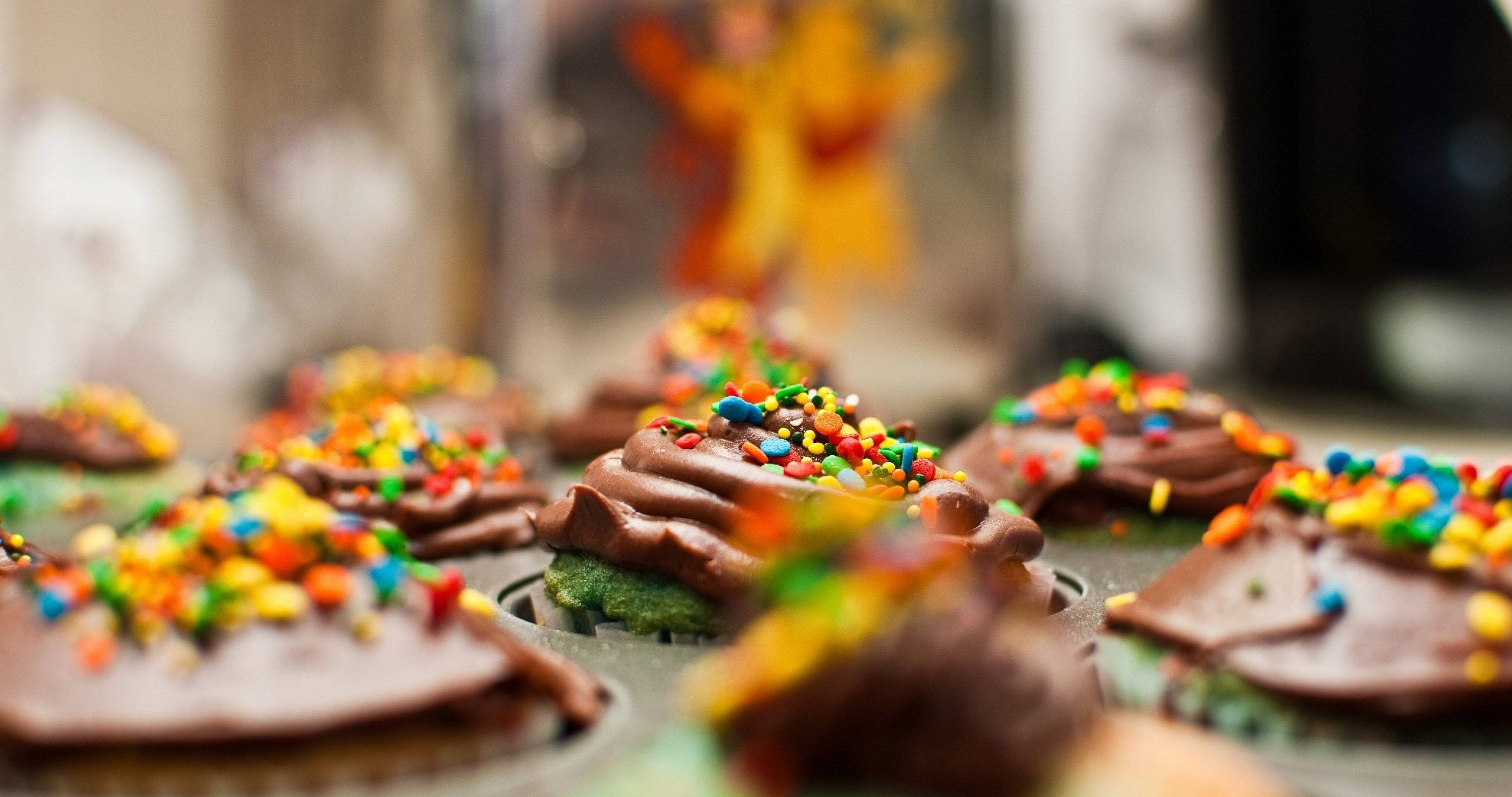 sprinkled cupcake, cupcakes, colorful sprinkle-topped cupcakes, 4K Desktop Wallpaper