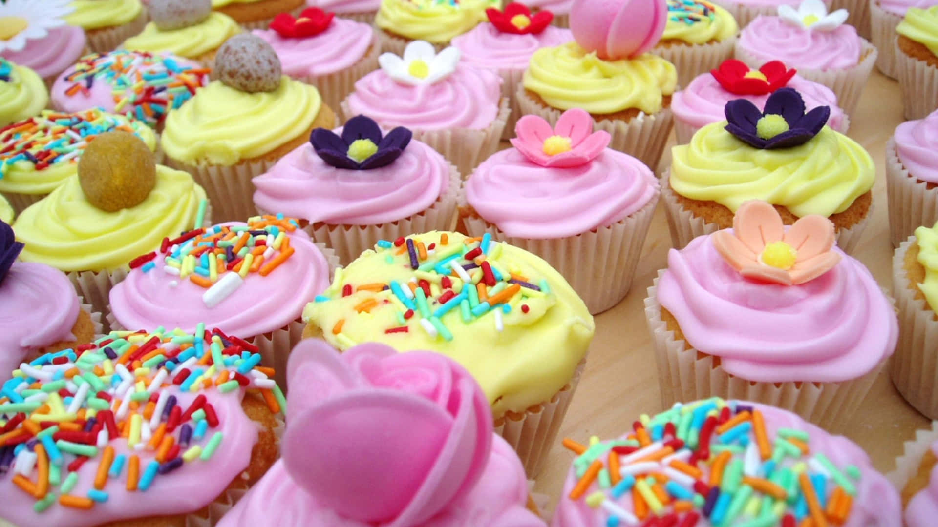 cupcakes, pink yellow frosting flowers, rainbow sprinkles, Full HD Desktop Wallpaper