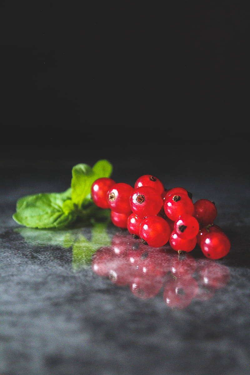 red currant, mint leaves, dark reflective surface, SD Phone Wallpaper