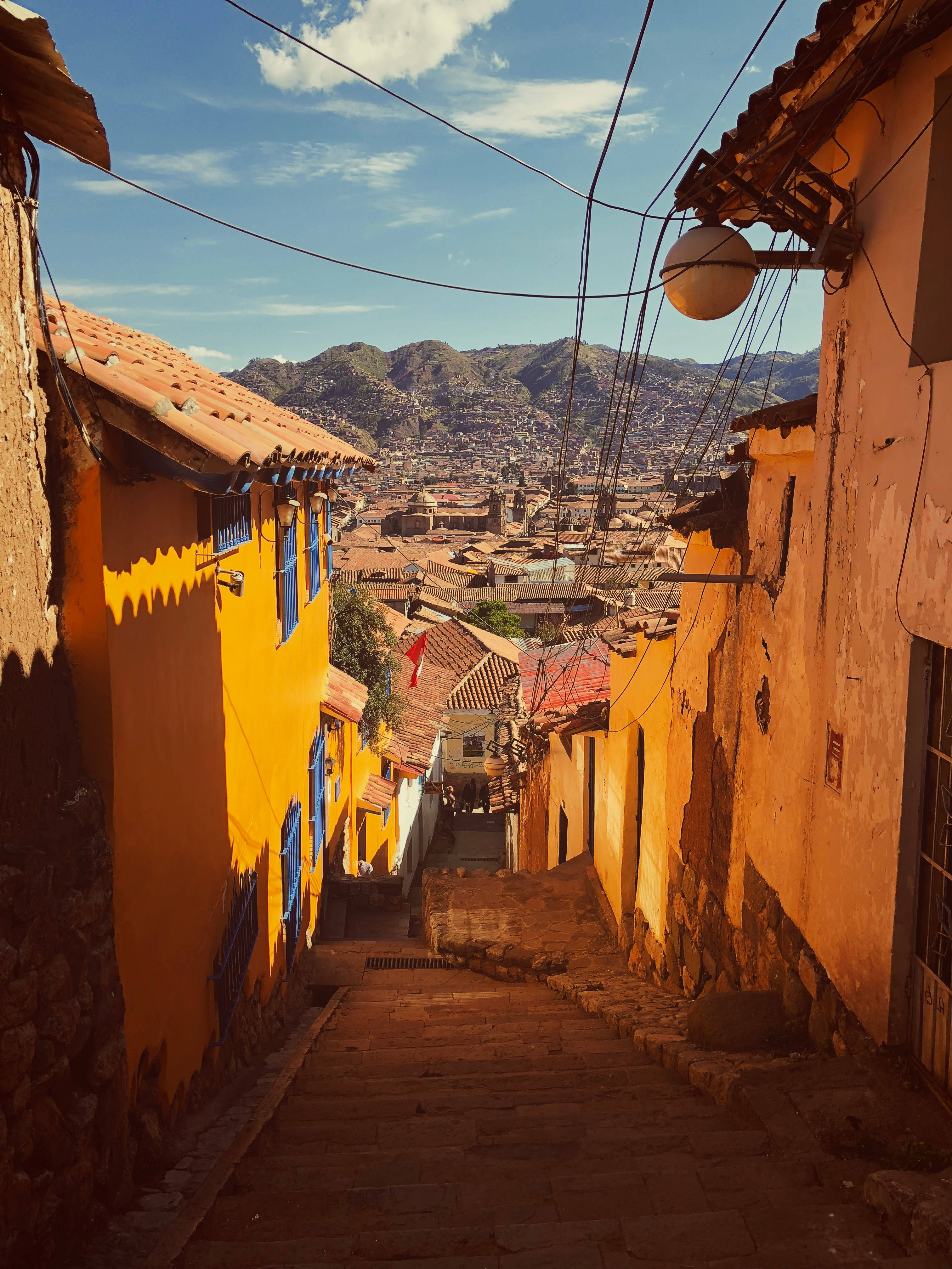 narrow alleyway, Cusco Peru, ochre buildings, 4K Phone Wallpaper