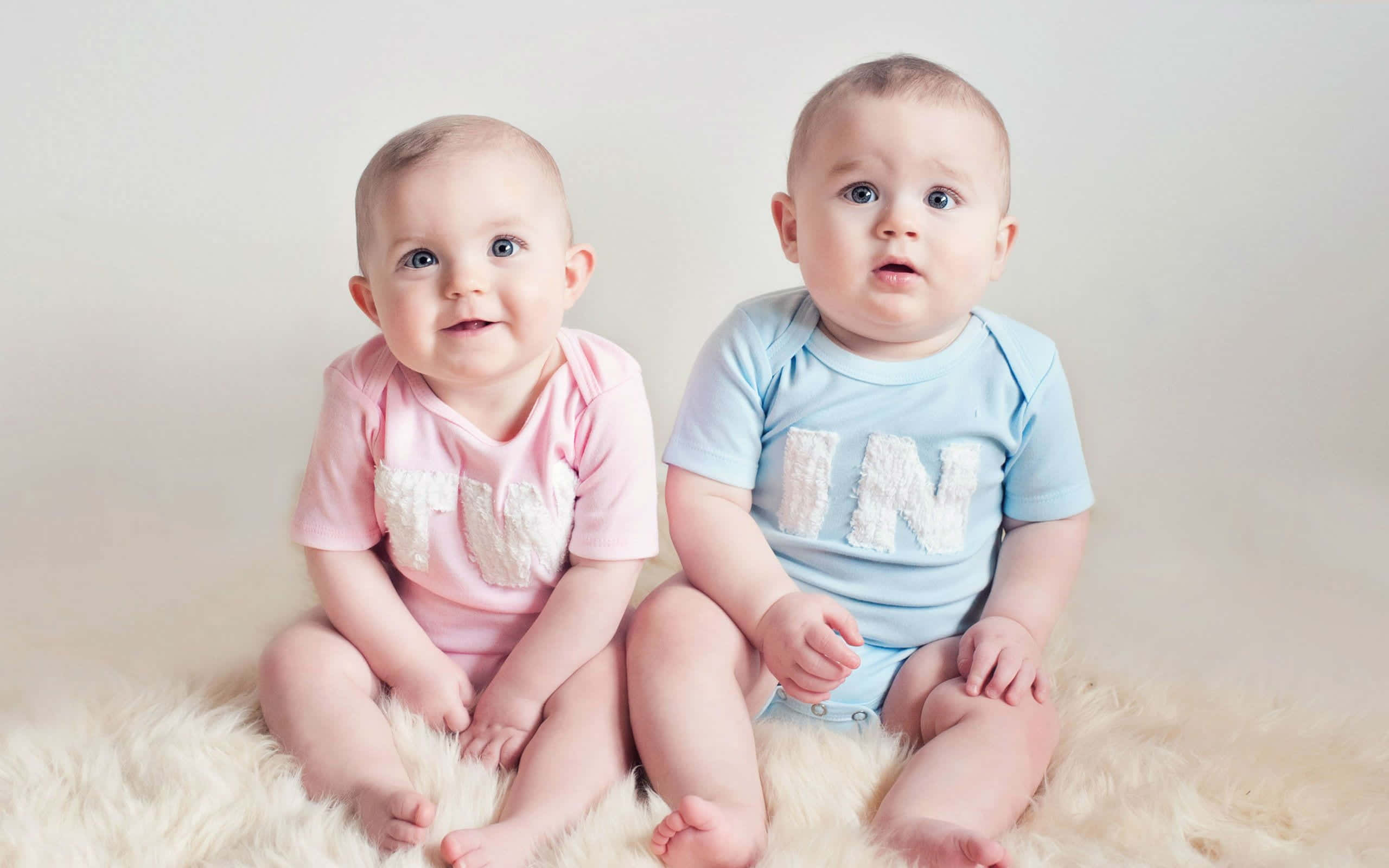 cute babies, pink outfit, blue outfit, 2K Desktop Wallpaper