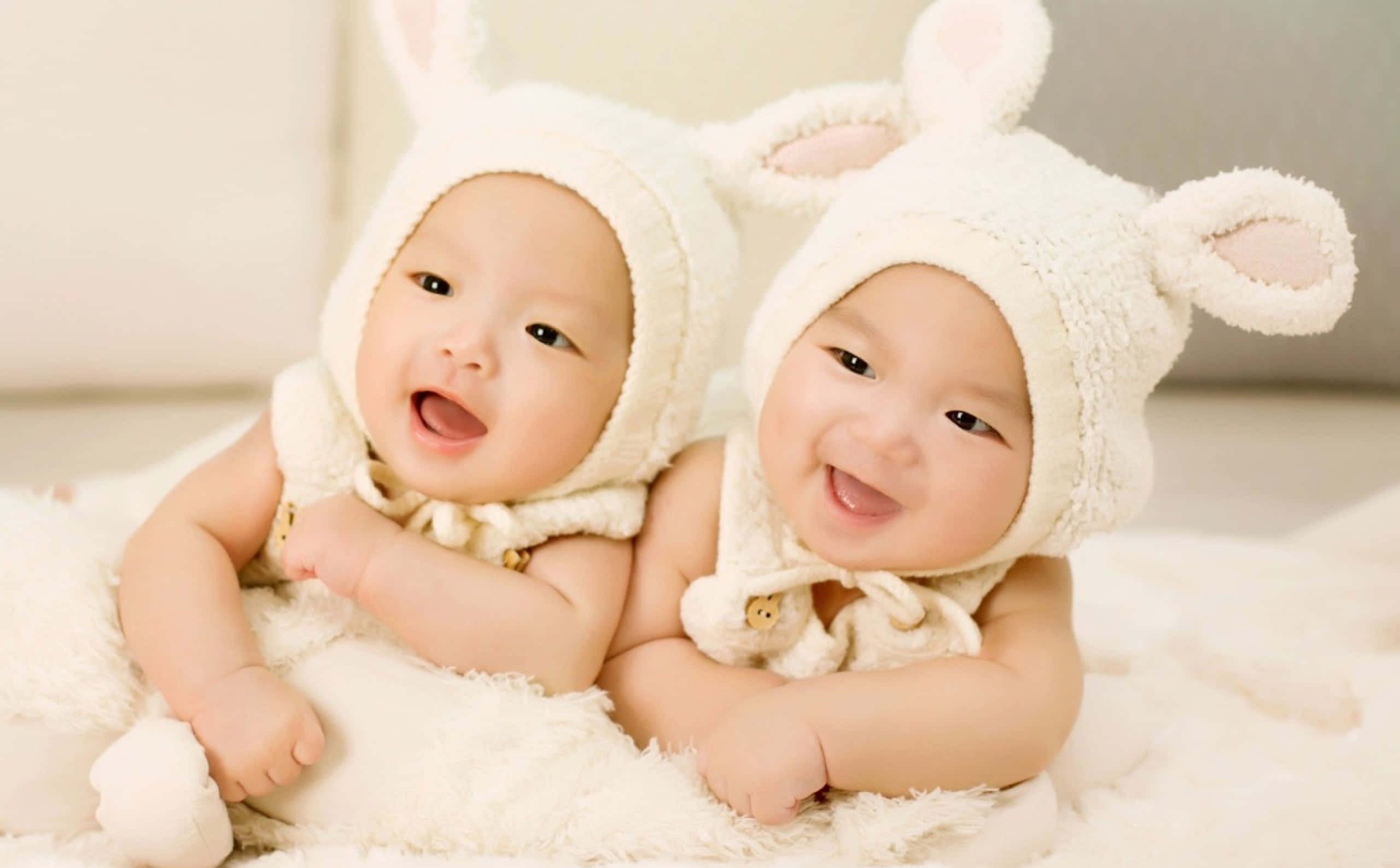 cute babies, fluffy white bunny hats, soft white rug, 2K Desktop Wallpaper