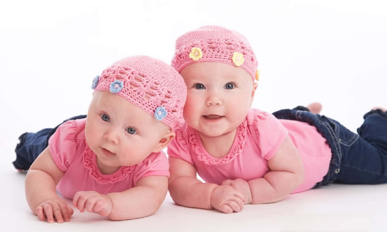 cute babies, pink crocheted hats, matching outfits, SD Desktop Wallpaper