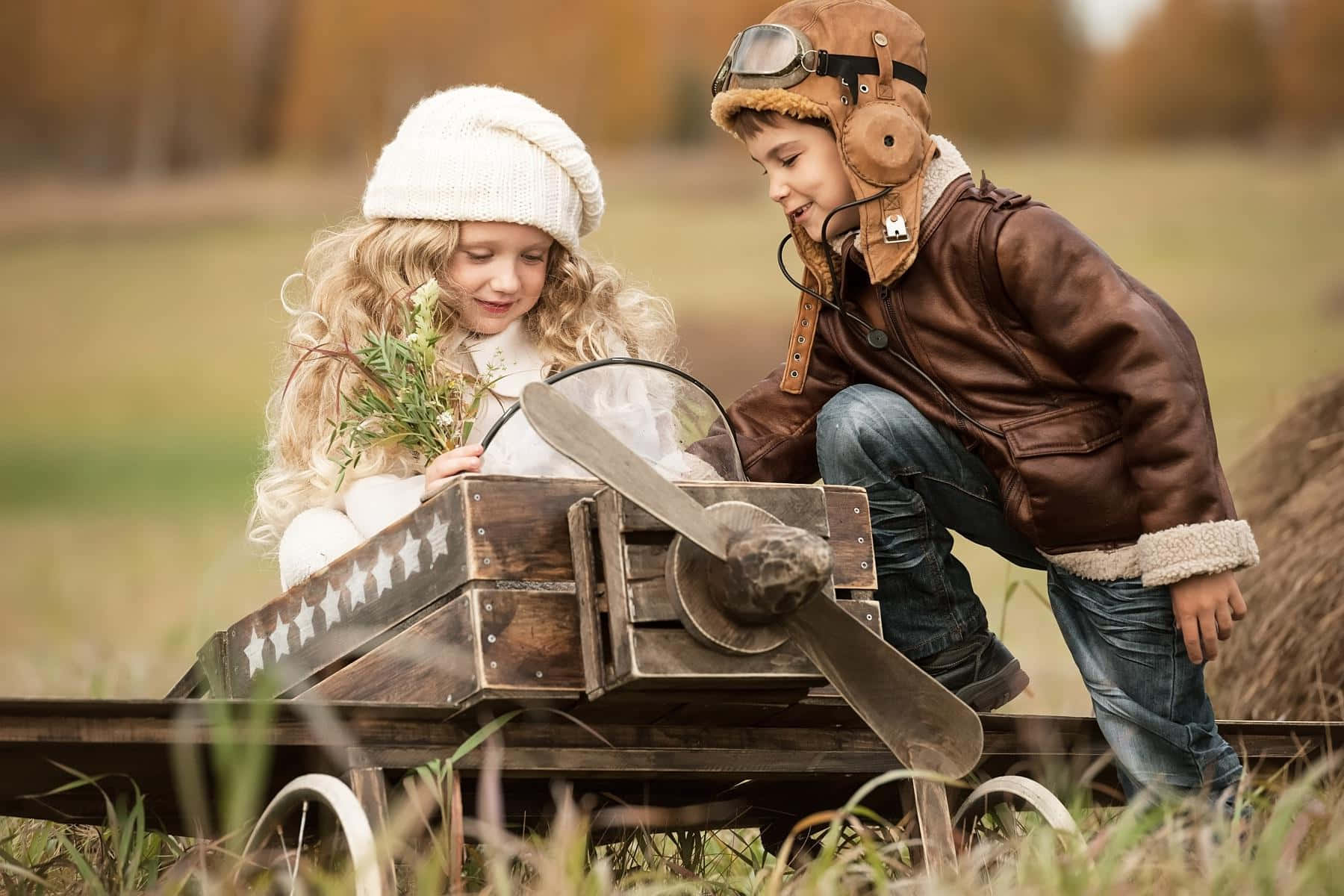 Cute Baby Couple, vintage pilot gear, wooden toy airplane, HD Desktop Wallpaper