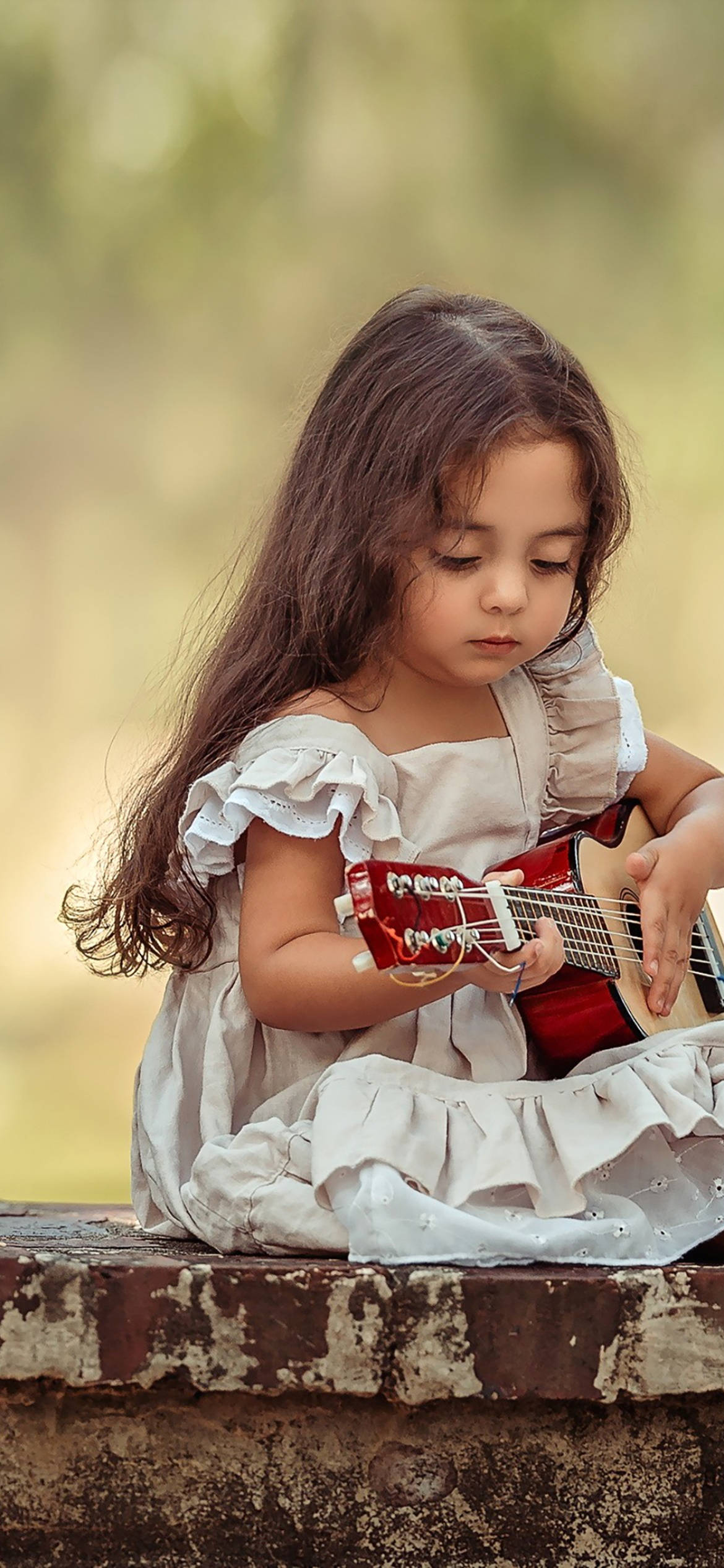 cute baby girl, red acoustic guitar, long dark hair, Full HD Phone Wallpaper