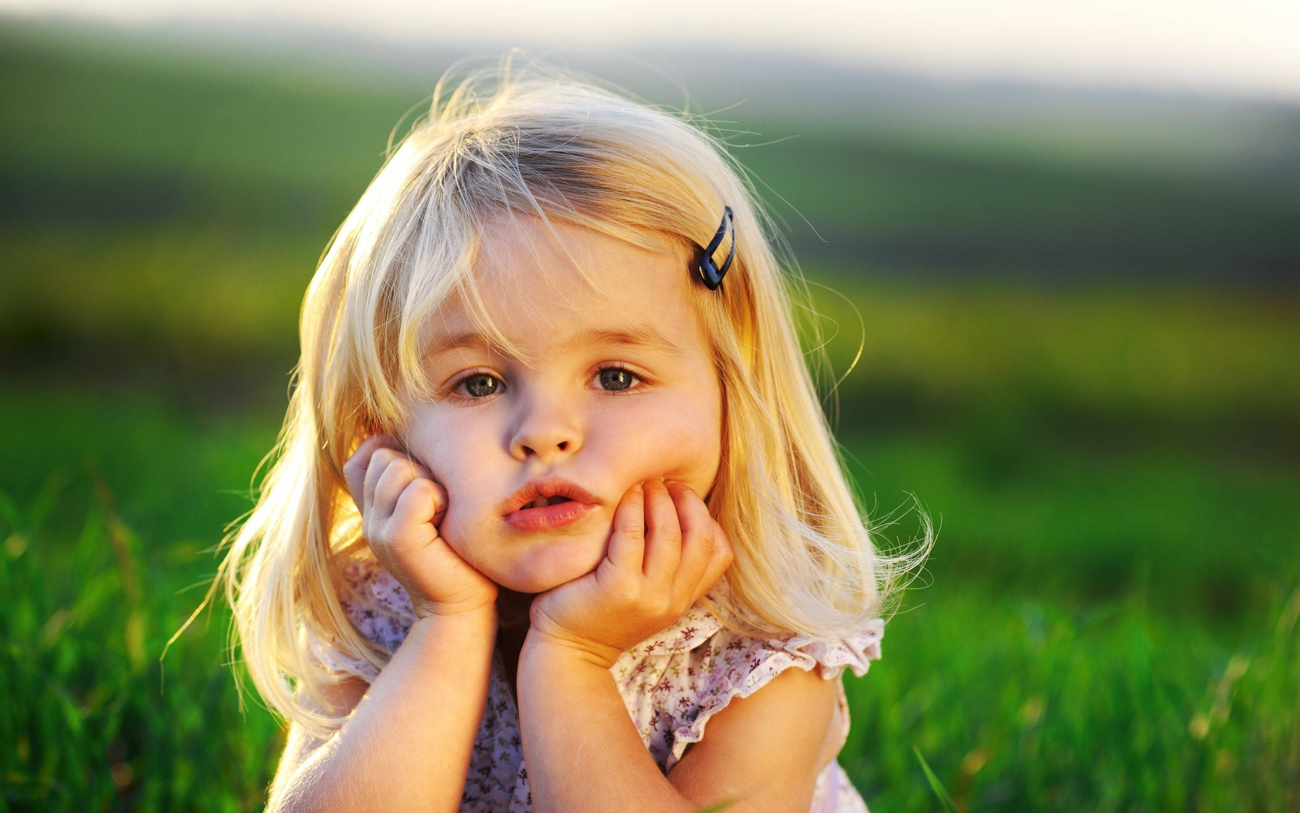 blonde toddler, cute girl, sunlit green field, 2K Desktop Wallpaper