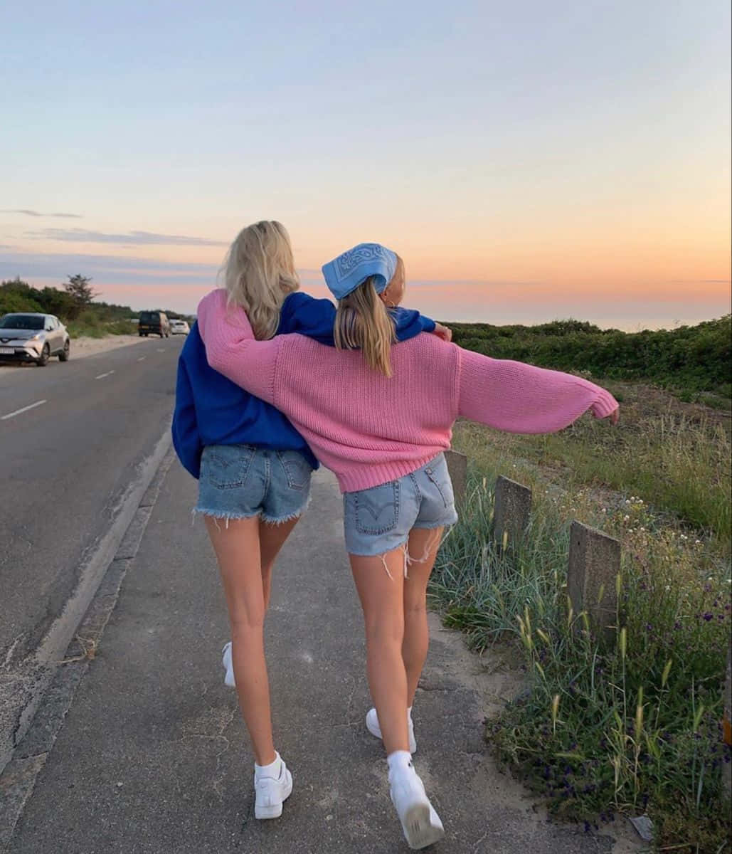 pink and blue sweaters, coastal road, sunset, SD Phone Wallpaper