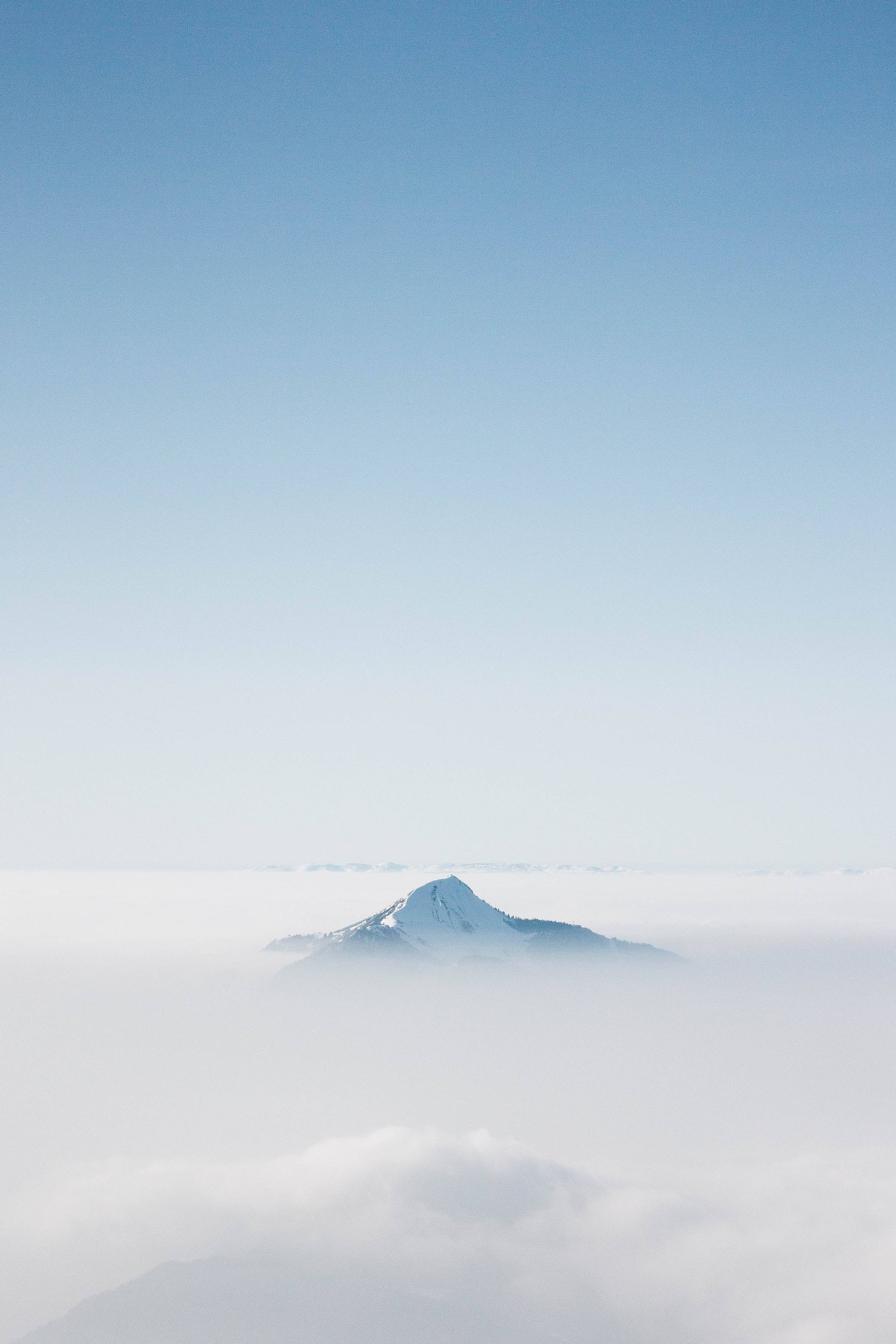 snowy mountain peak, sea of clouds, clear blue sky, 2K Phone Wallpaper