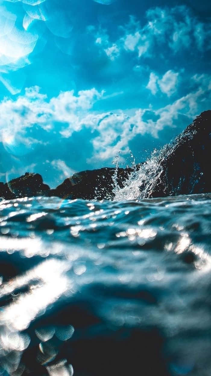 Cute Blue iPhone, ocean water, vivid blue sky, SD Phone Wallpaper