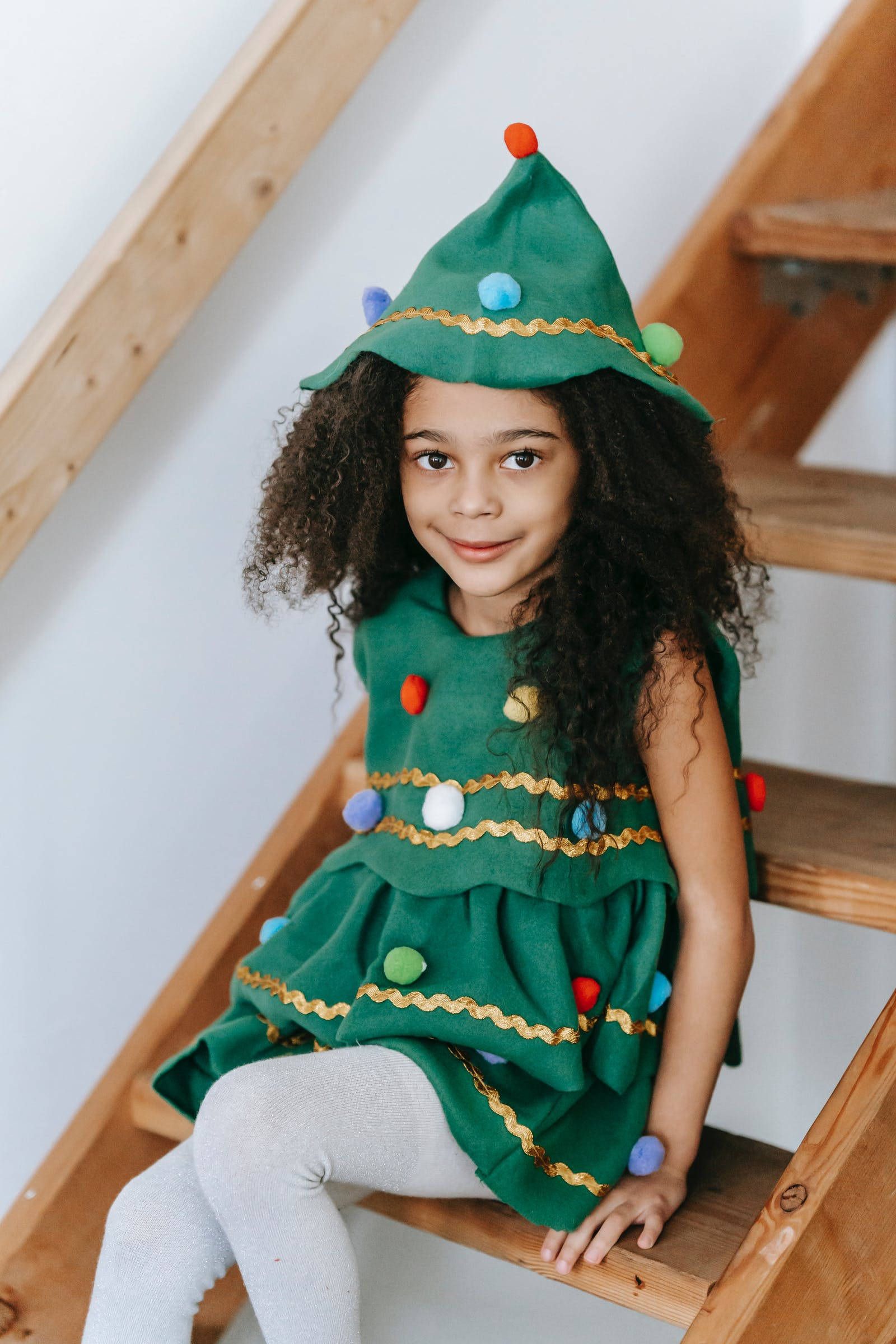 green Christmas tree costume, child, wooden stairs, Full HD Phone Wallpaper