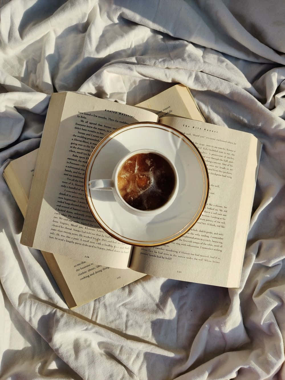 steaming cup of coffee, open book, rumpled white sheets, HD Phone Wallpaper