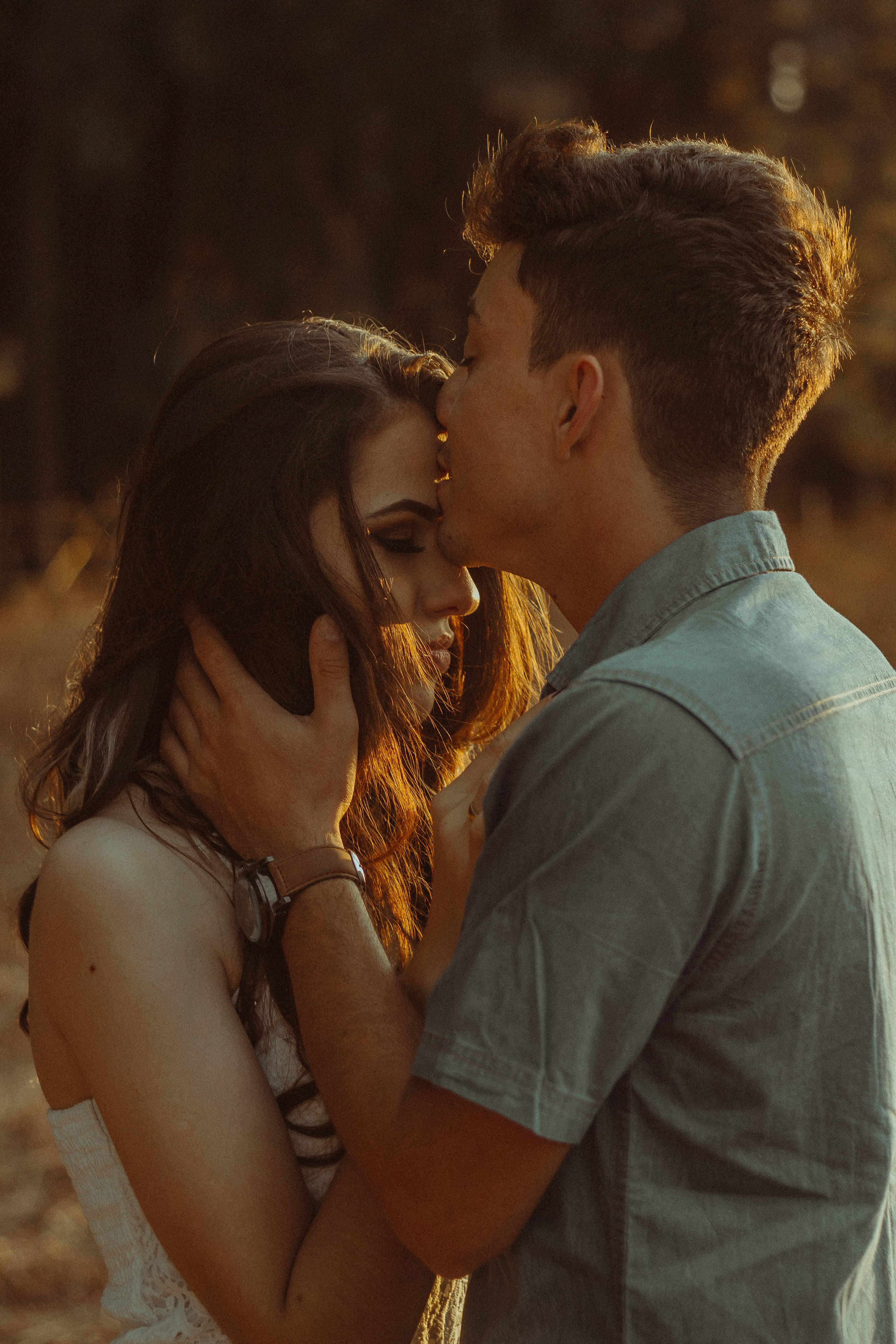 romantic couple forehead kiss, forehead kiss, golden sunlight, 5K Phone Wallpaper