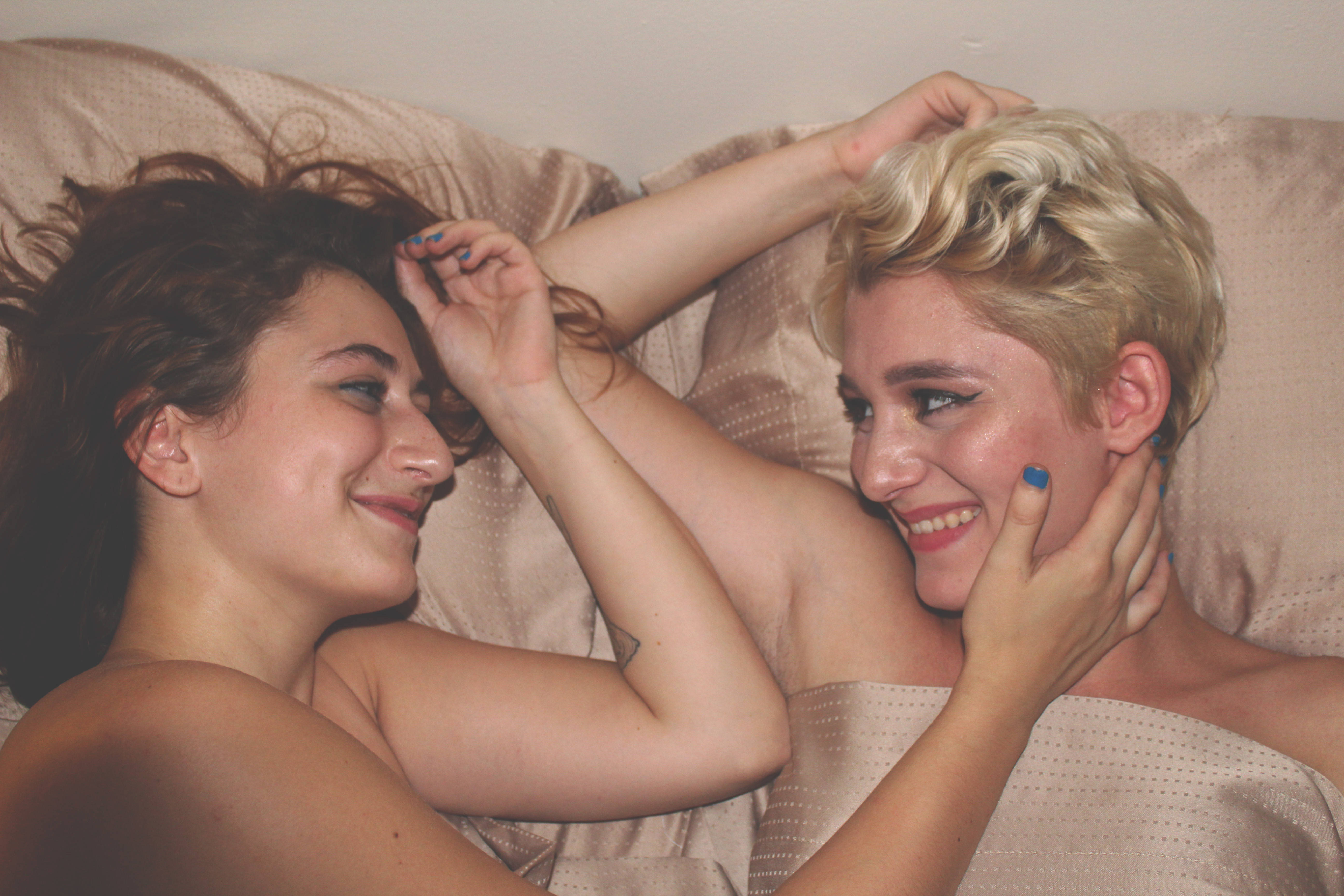 lesbian couple, blue nail polish, beige bedspread, 5K Desktop Wallpaper