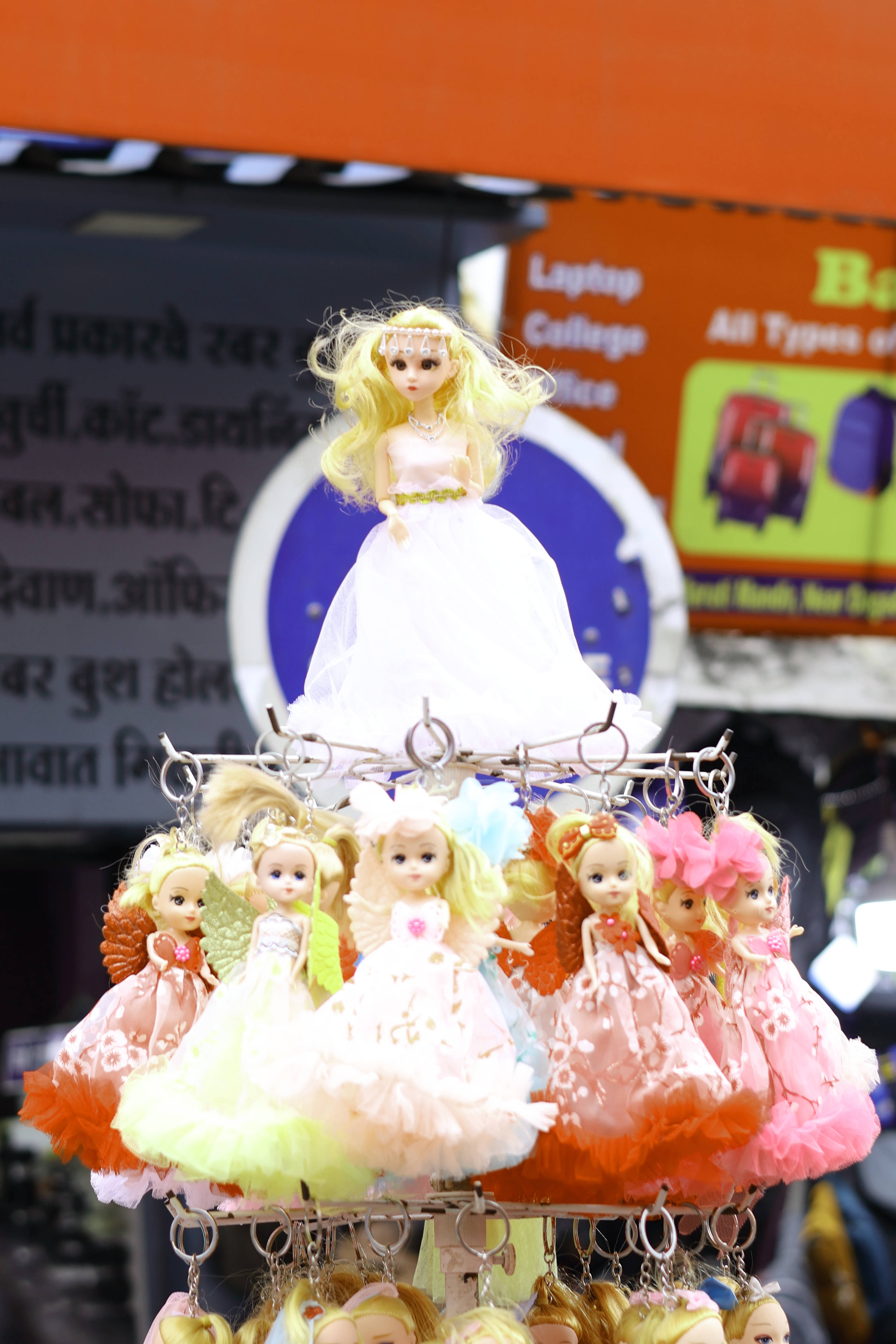 cute dolls, tiered display, colorful doll keychains, 4K Phone Wallpaper