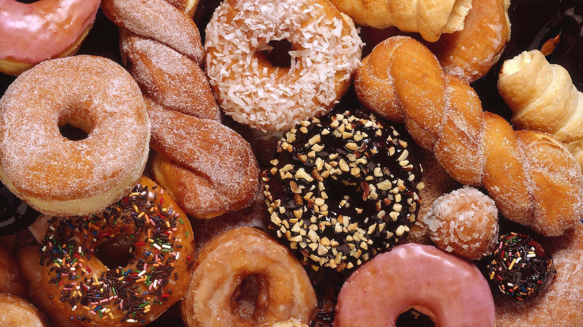 assorted glazed donuts, sprinkled donuts, vibrant toppings, Full HD Desktop Wallpaper