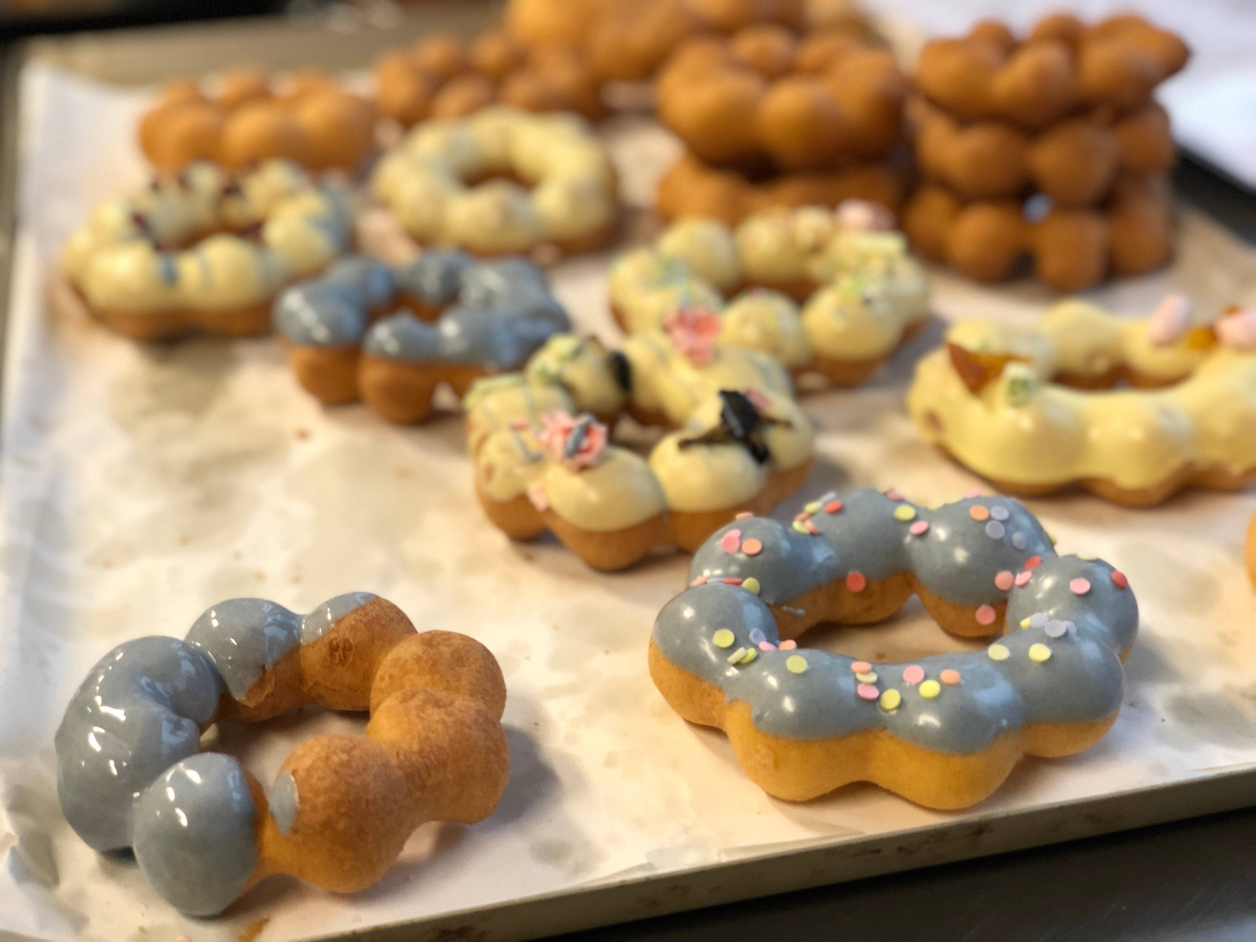 flower donuts tray, blue and yellow glaze, colorful sprinkles, 4K Desktop Wallpaper
