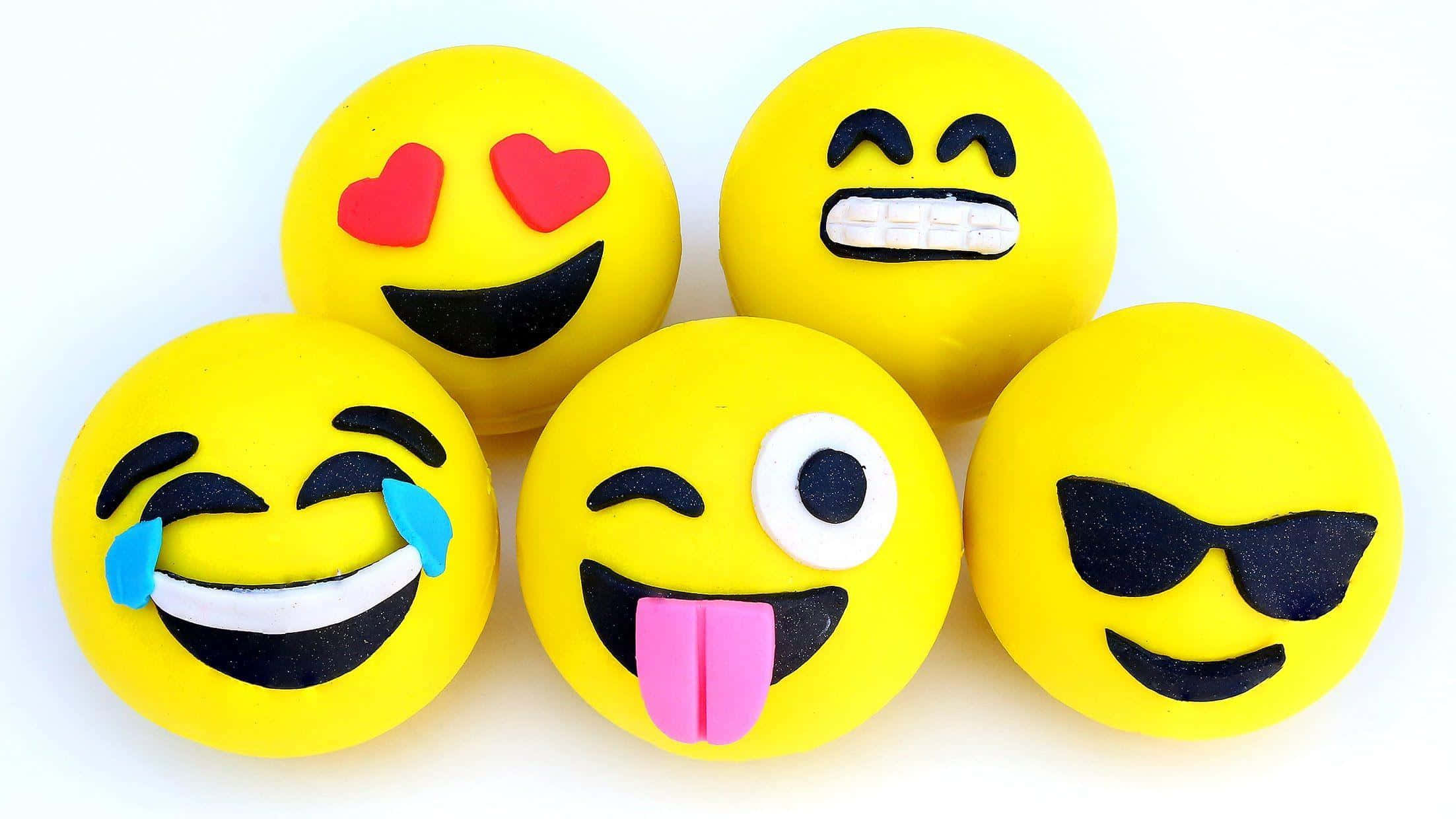 emoji-shaped clay figures, bright yellow, heart eyes, Full HD Desktop Wallpaper