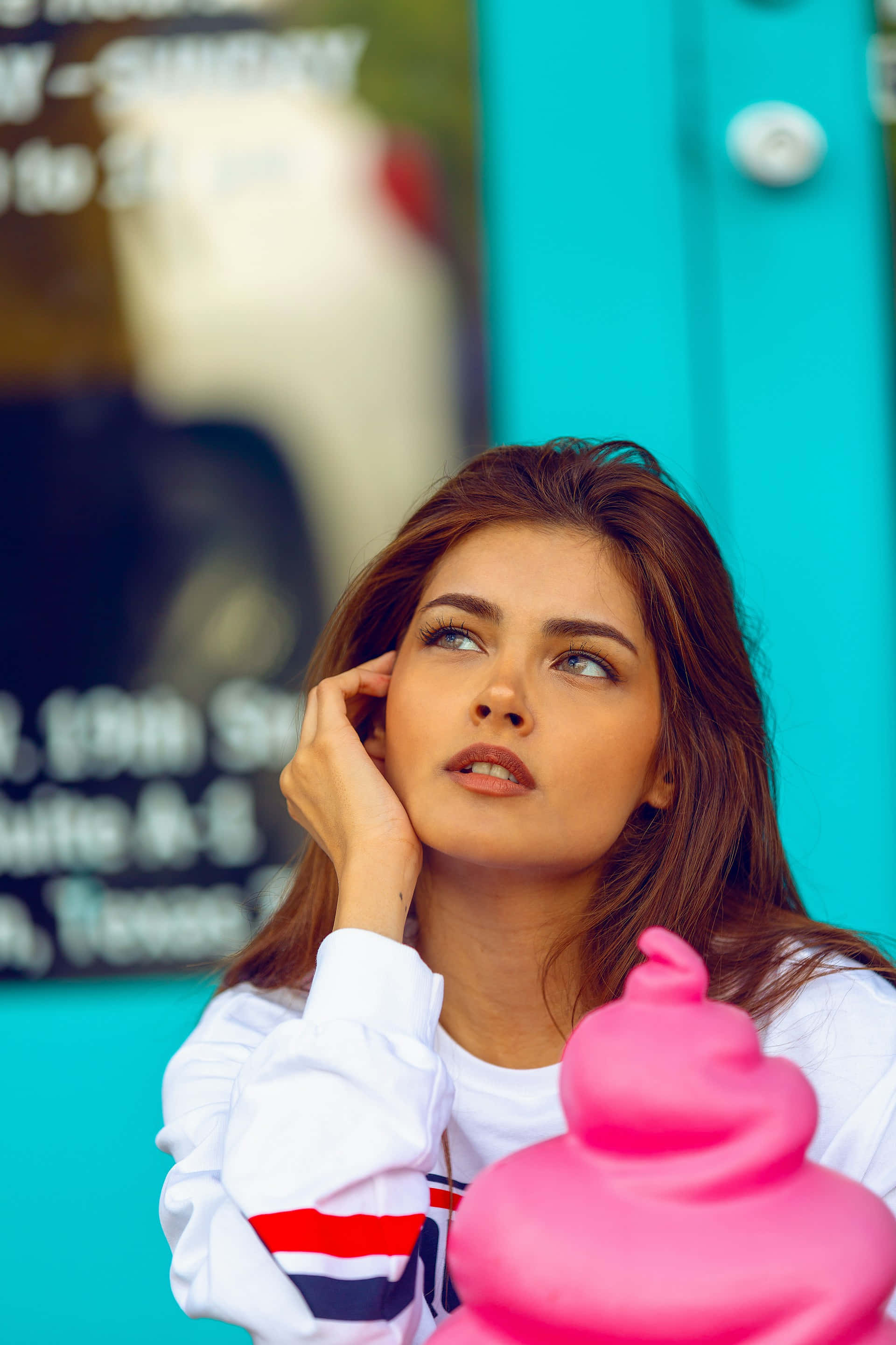 Dreamy Aesthetic Girlwith Blue Backdrop, bright pink ice cream cone, vibrant turquoise wall, 2K Phone Wallpaper