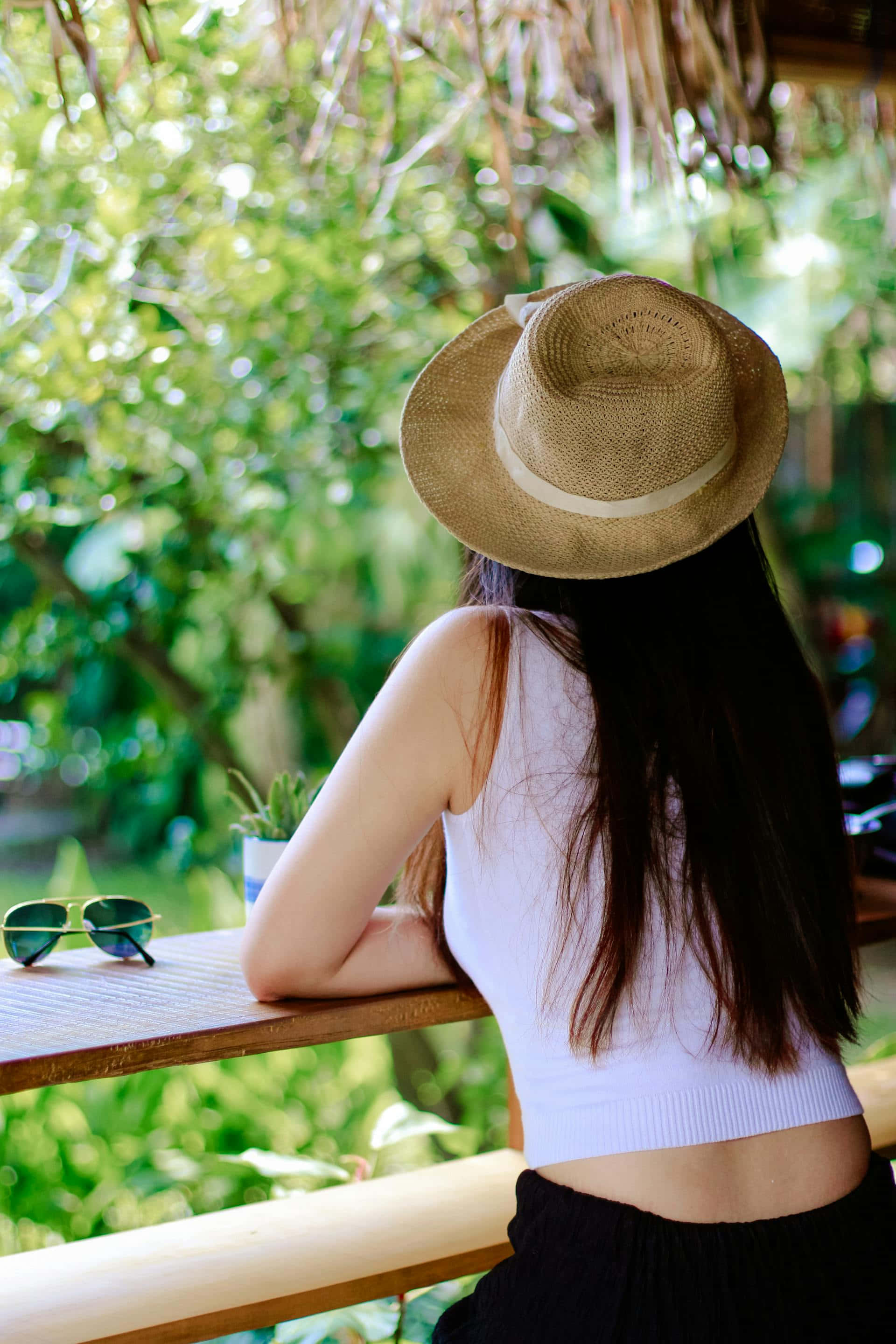 straw hat, white top, wooden railing, 2K Phone Wallpaper