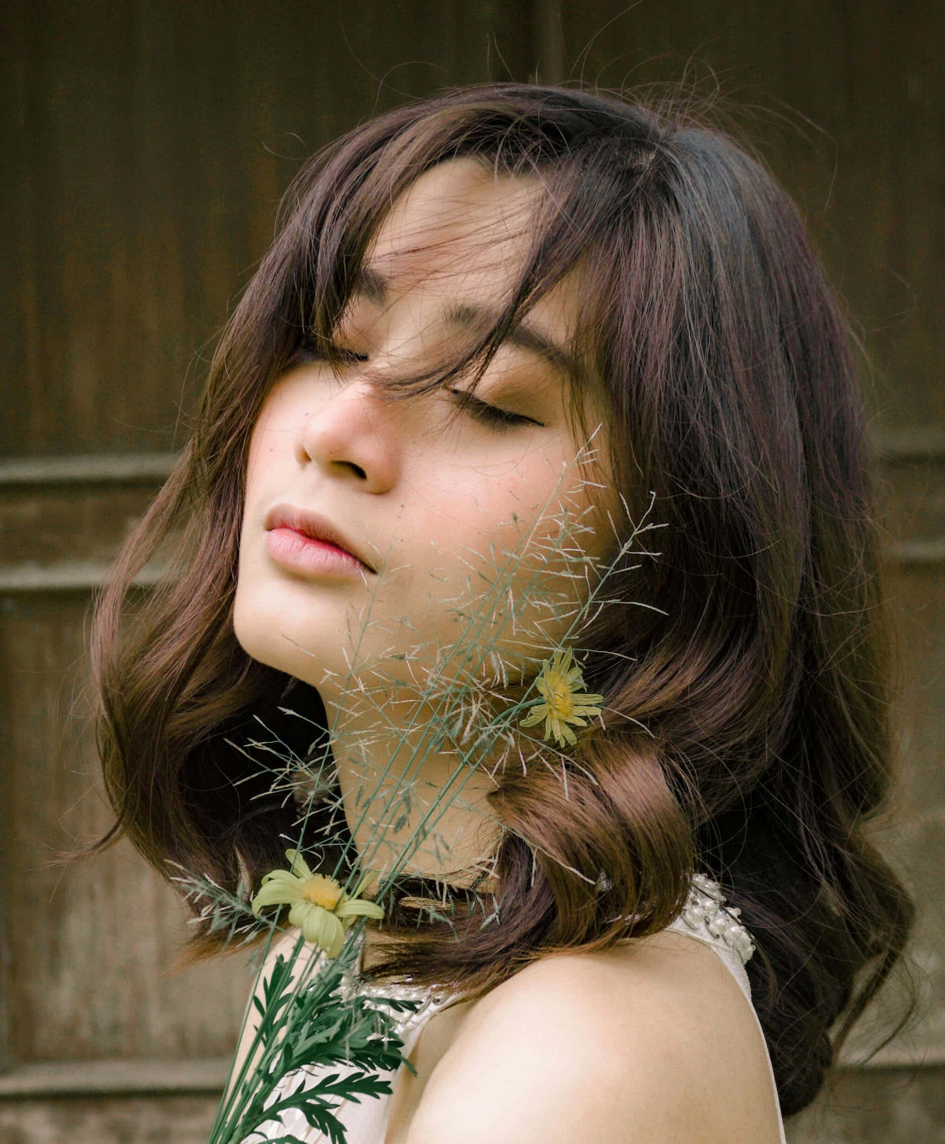 Dreamy Girl With Flowers, dark wavy hair, wispy grass, Full HD Phone Wallpaper