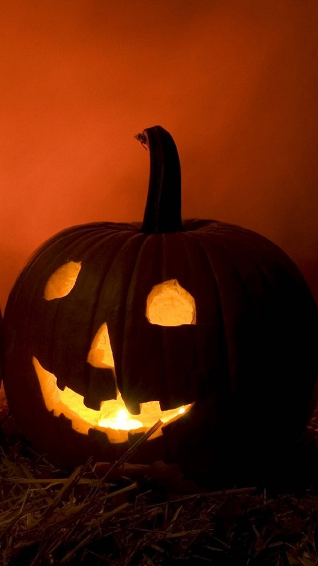 Cute Lighted Halloween Pumpkin iPhone, glowing jack-o'-lantern, wide grin, Full HD Phone Wallpaper