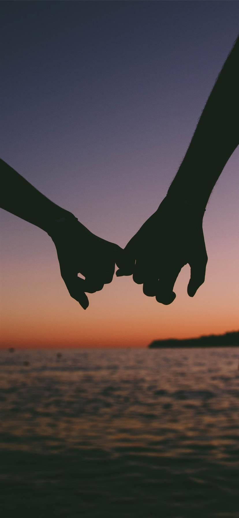 silhouetted hands, vibrant sunset, calm water, HD Phone Wallpaper
