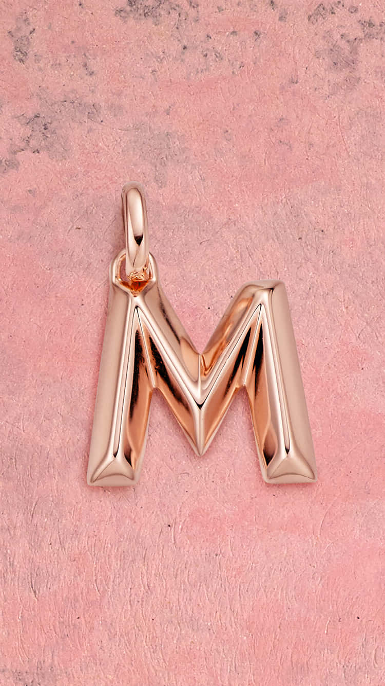 rose gold, letter M pendant, sharp geometric edges, HD Phone Wallpaper