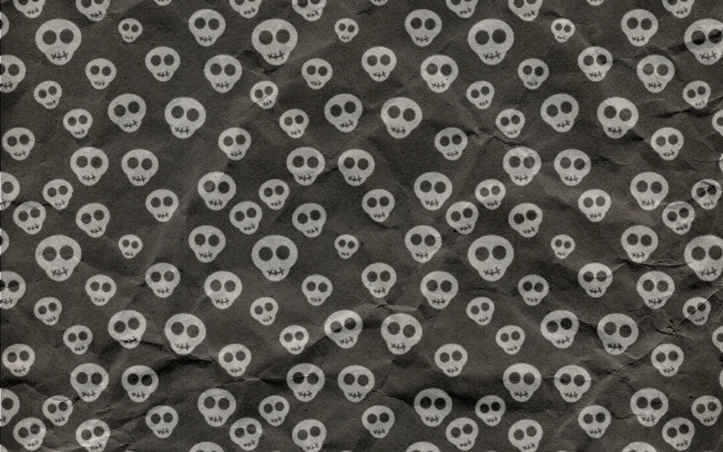 Cute Macbook Pro, dark gray paper, white cartoon skulls, HD Desktop Wallpaper